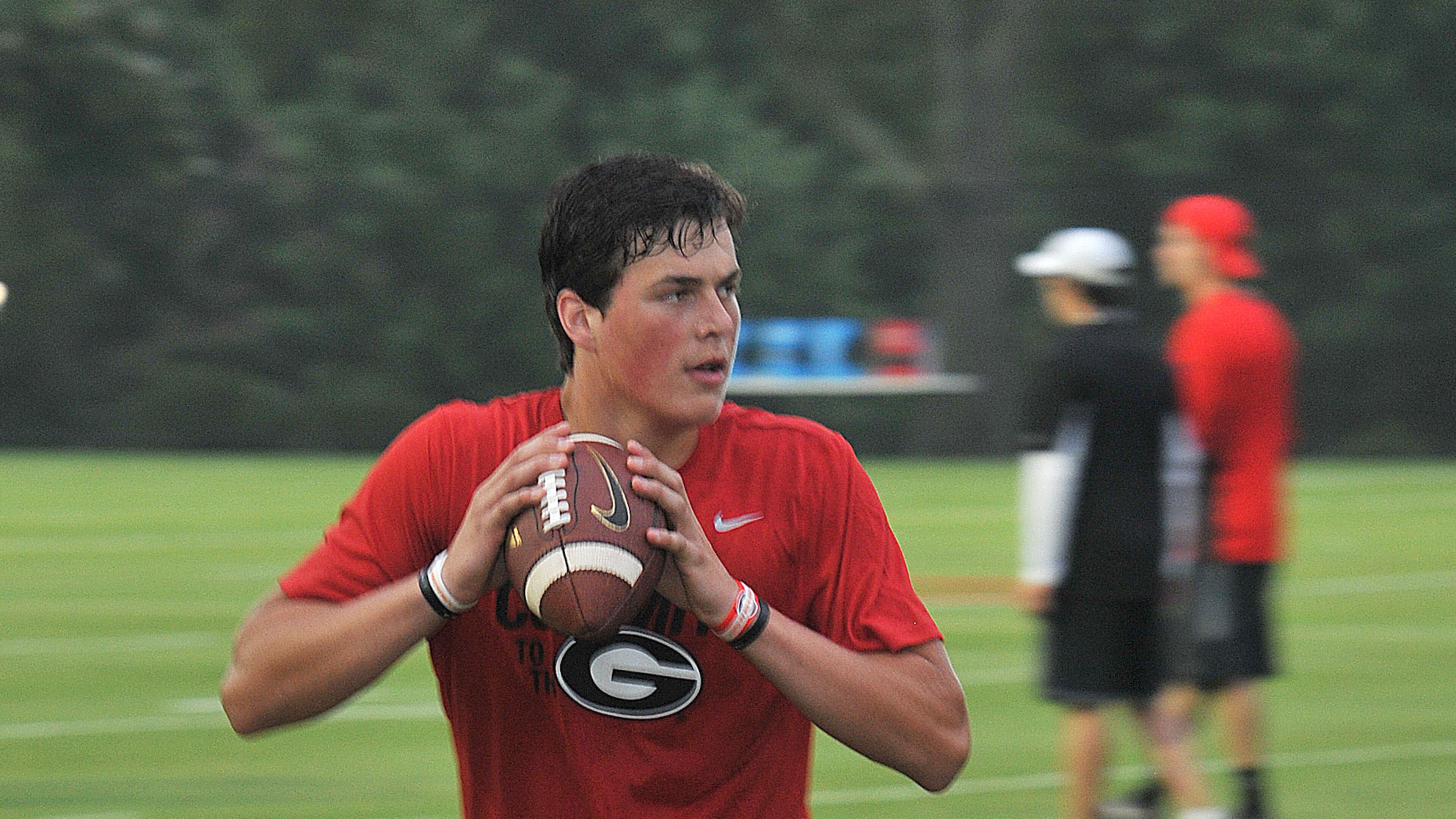 Jacob Eason, the nation’s top QB target for 2016, from the state of Washington, goes through passing drills on the University of Georgia practice field in July 2014. (CHRIS HUNT/SPECIAL)