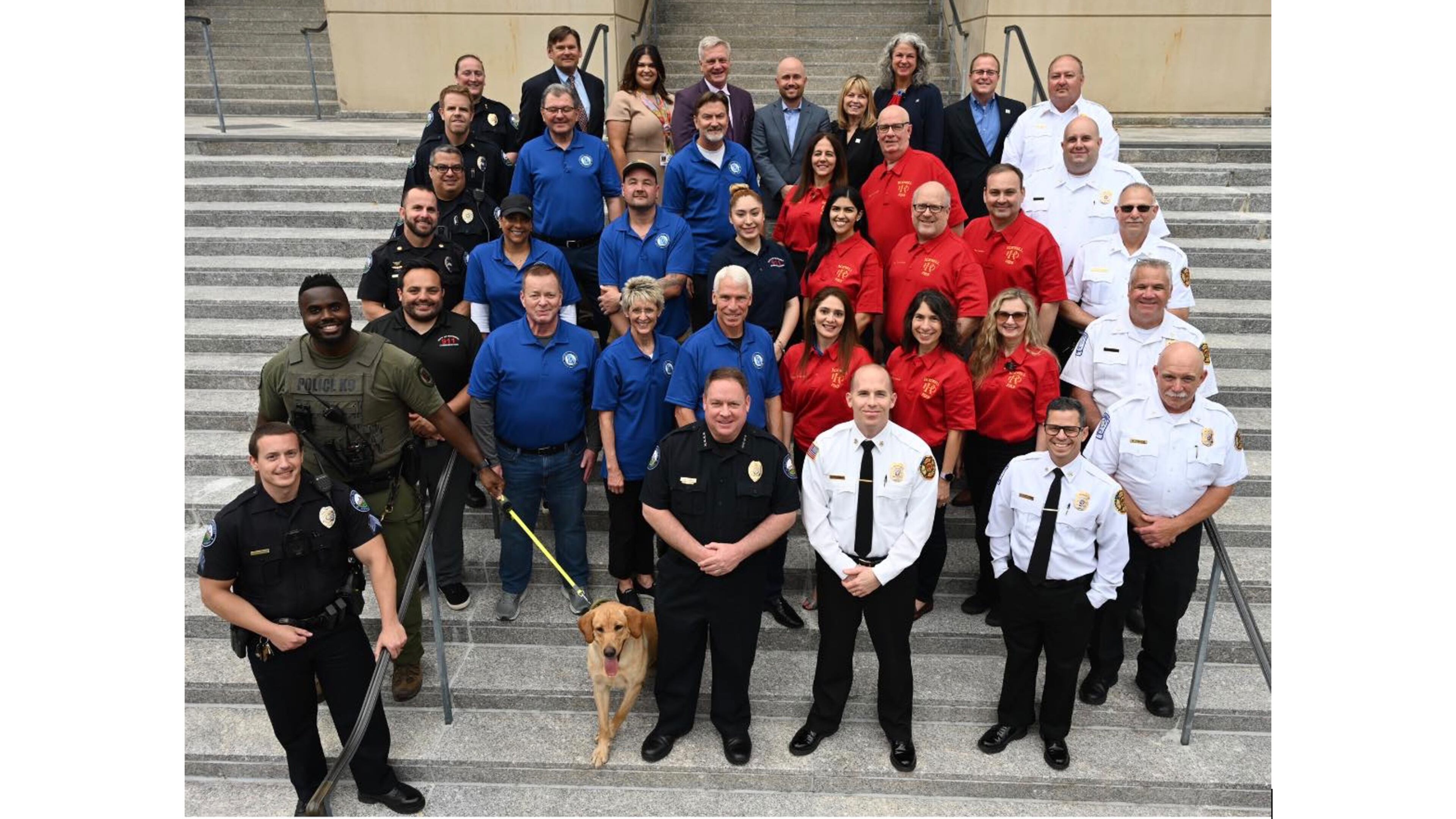 The Roswell City Council recently honored graduates of the city’s first Citizen's Fire Academy (in red) and graduates of the Roswell Police Department’s Citizen’s Police Academy (in blue). (Courtesy City of Roswell)