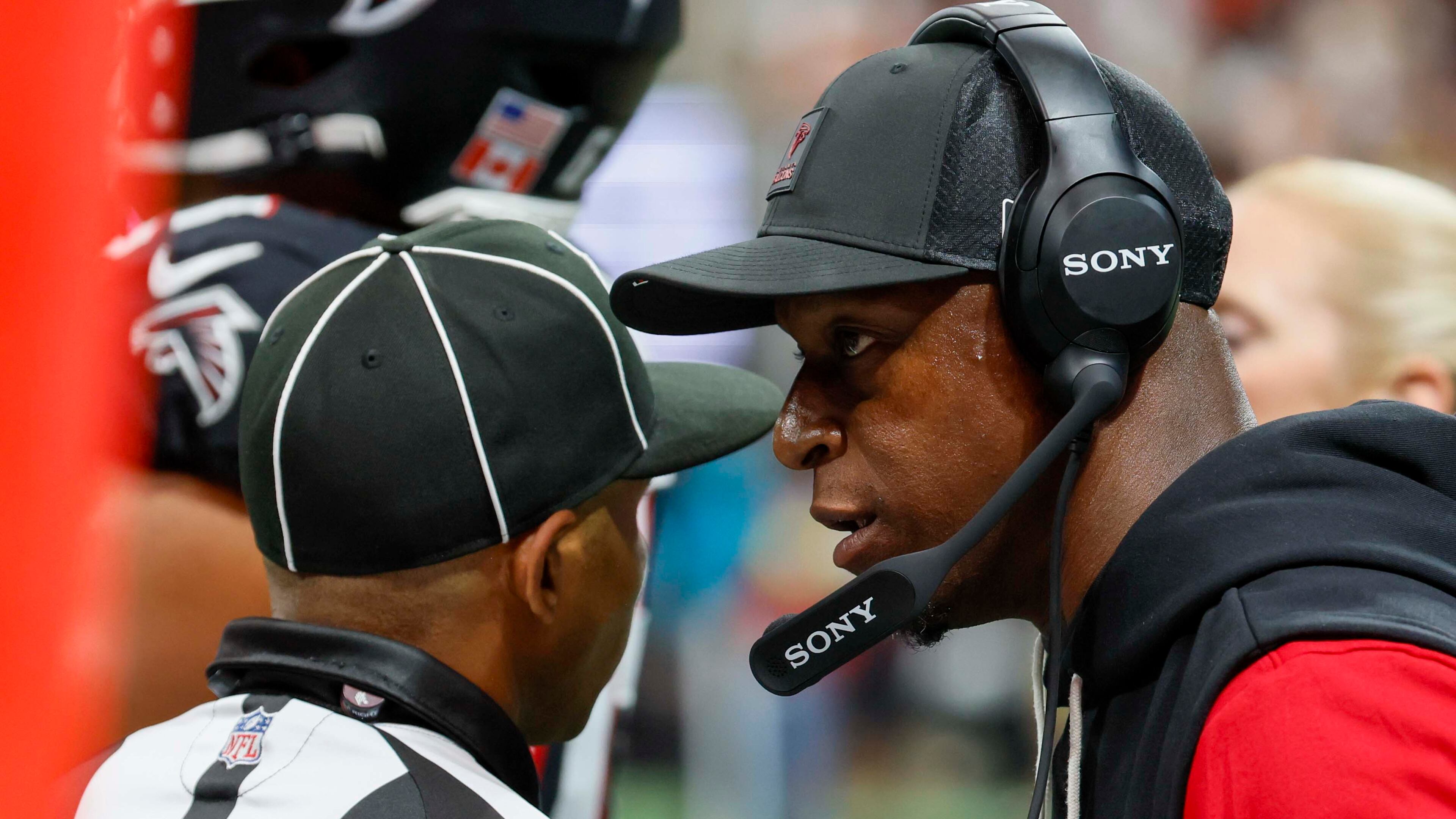 Falcons head coach Raheem Morris speaks with a referee as he challenges a play during the second half of an NFL game against the Tampa Bay Buccaneers at Mercedes-Benz Stadium on Sunday, September 7, 2025, in Atlanta.
(Miguel Martinez/ AJC)