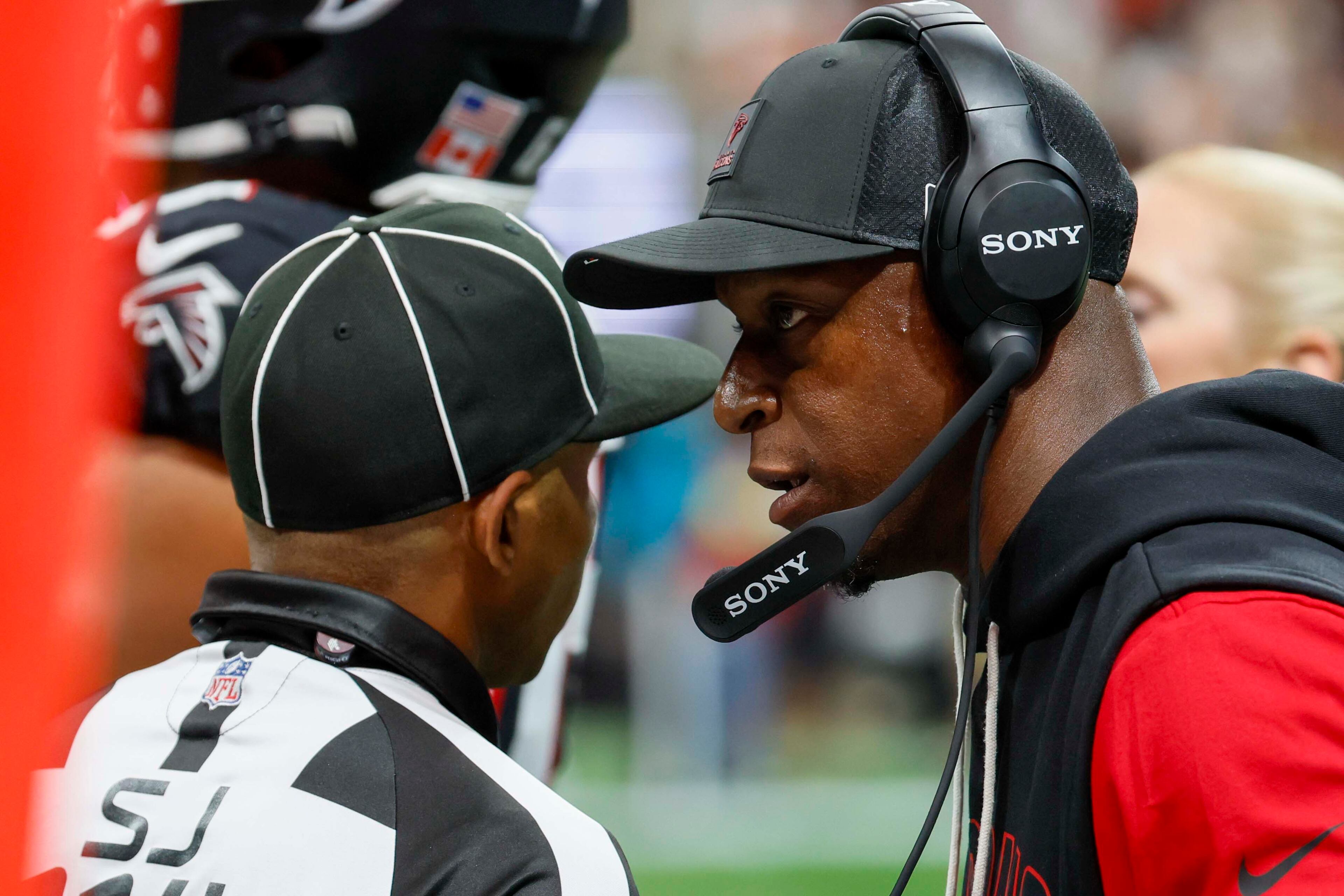 Falcons head coach Raheem Morris speaks with a referee as he challenges a play during the second half of an NFL game against the Tampa Bay Buccaneers at Mercedes-Benz Stadium on Sunday, September 7, 2025, in Atlanta.
(Miguel Martinez/ AJC)