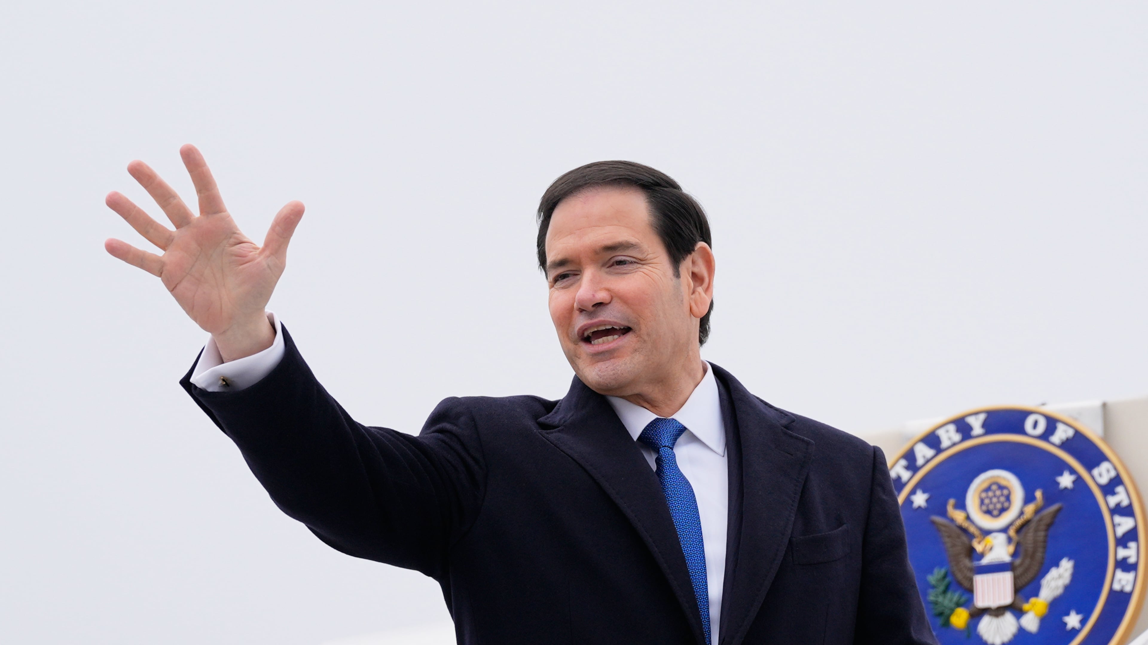 U.S. Secretary of State Marco Rubio waves as he departs at the Liszt Ferenc International Airport in Budapest, Hungary, Monday, Feb. 16, 2026. (AP Photo/Alex Brandon, Pool)