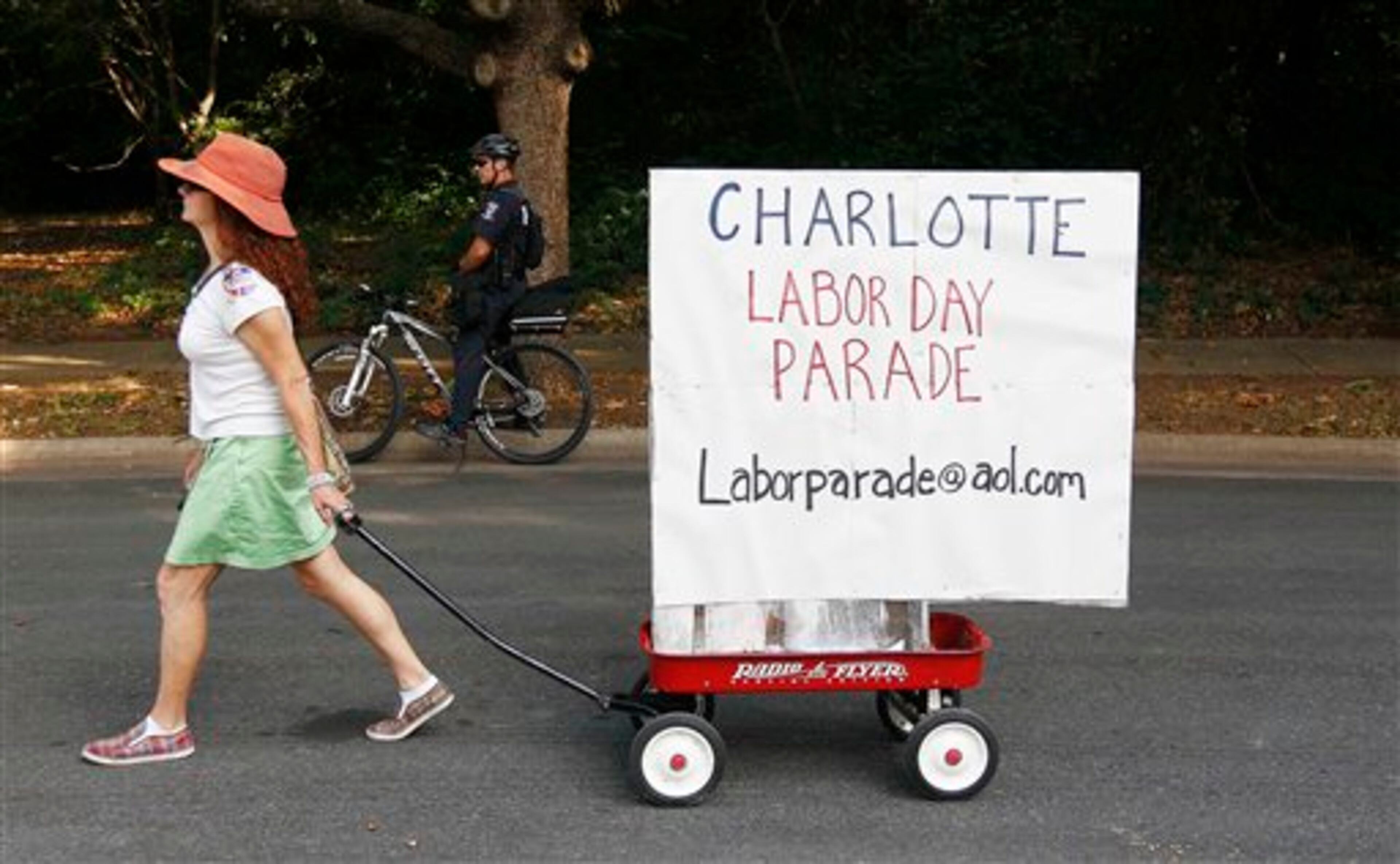 Demonstrators march in a Labor Day parade, Monday, Sept. 3, 2012, in Charlotte, N.C. Demonstrators are protesting before the start of the Democratic National Convention.(AP Photo/Gerry Broome)