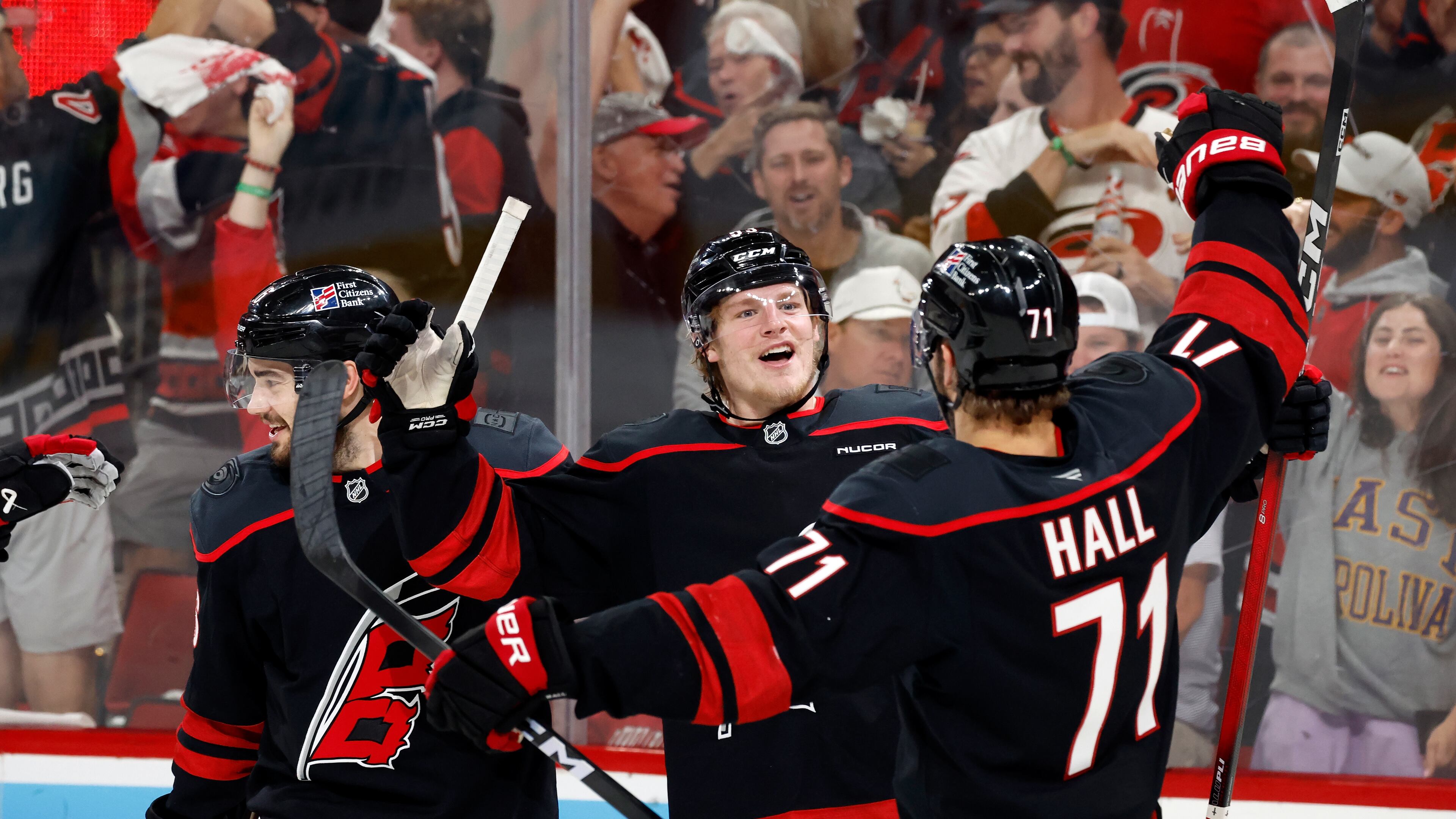 Carolina Hurricanes' Jackson Blake (53) celebrates his goal with teammate Taylor Hall (71) during the second period in Game 5 of the Eastern Conference finals NHL hockey Stanley Cup playoff series against the Montreal Canadiens in Raleigh, N.C., Friday, May 29, 2026. (AP Photo/Karl DeBlaker)