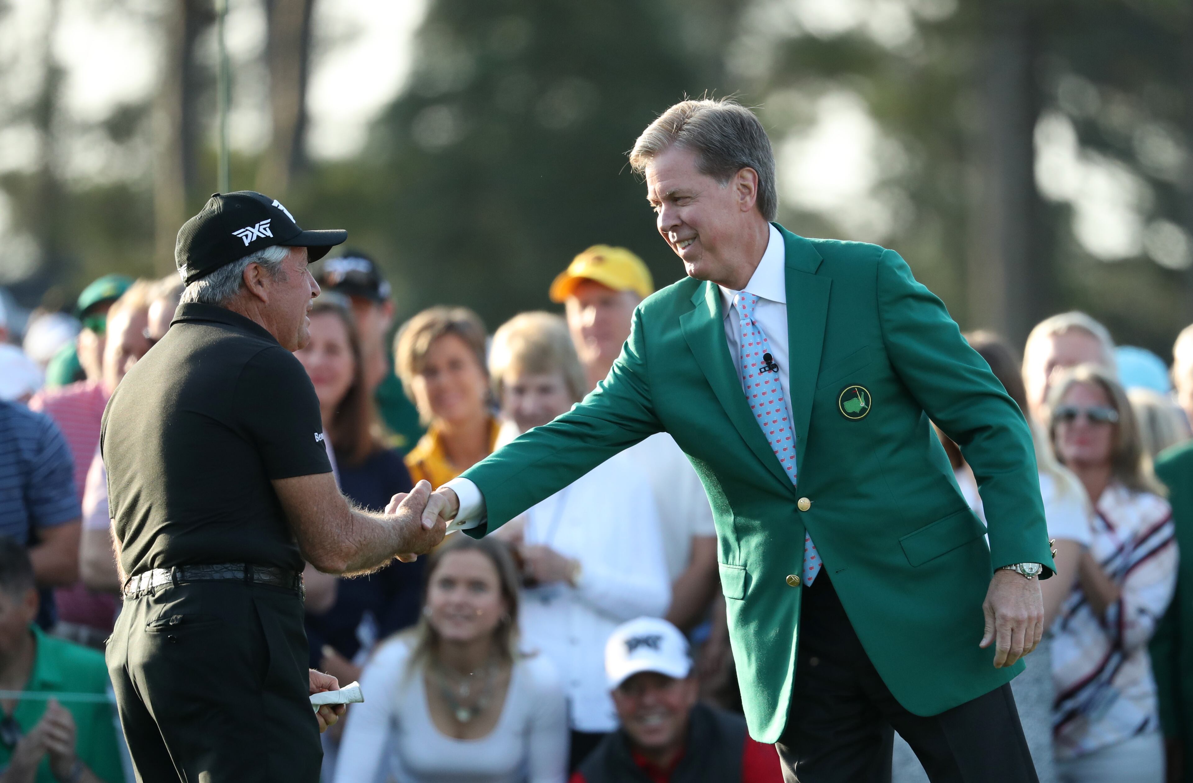 Gary Player after Masters Chairman Fred Ridley after Player hit on the first tee to start the 2019 Masters. (Jason Getz/Special to the AJC)