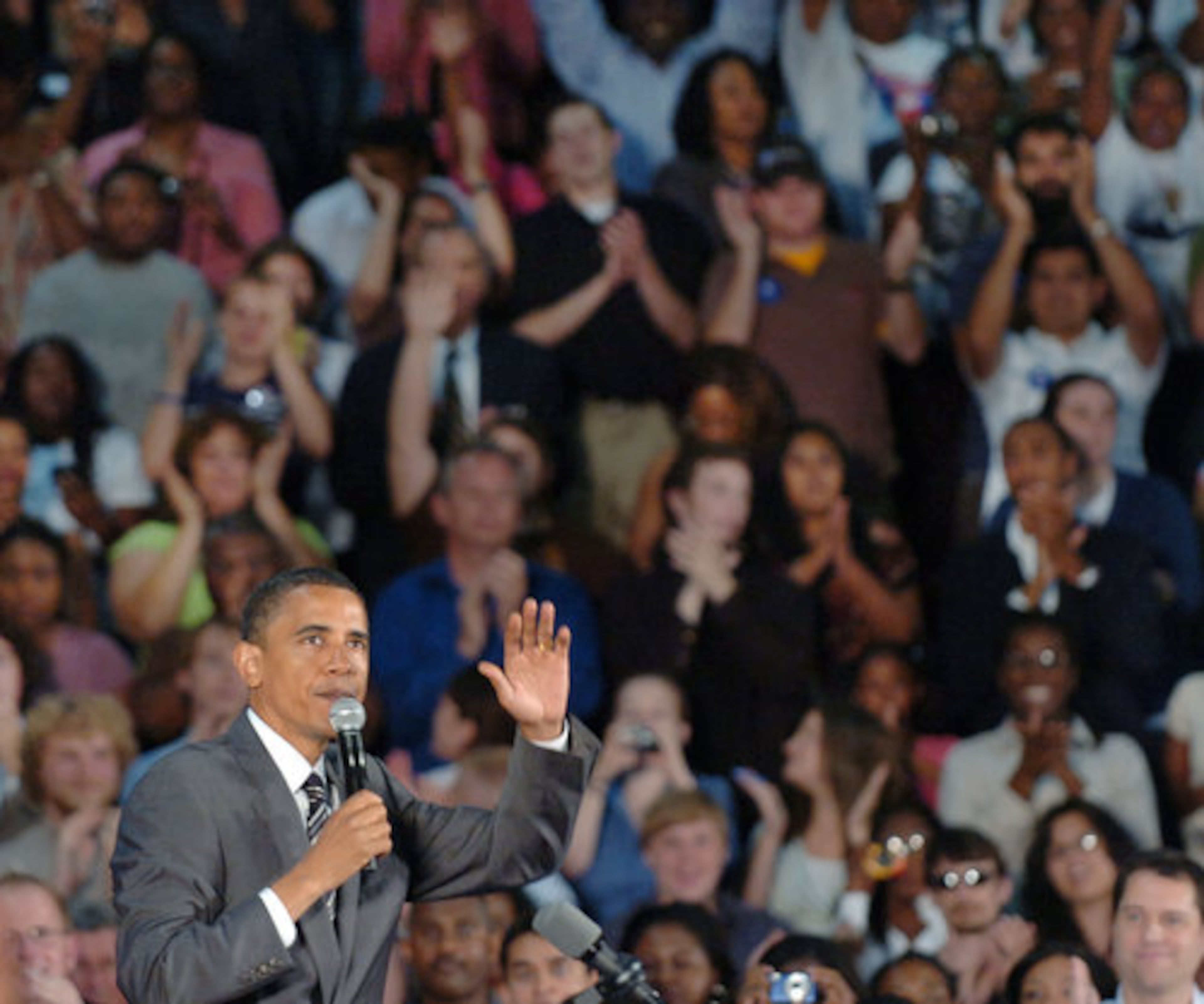 Sen. Barack Obama acknowledges the crowd while speaking at a town hall forum in Cobb County.