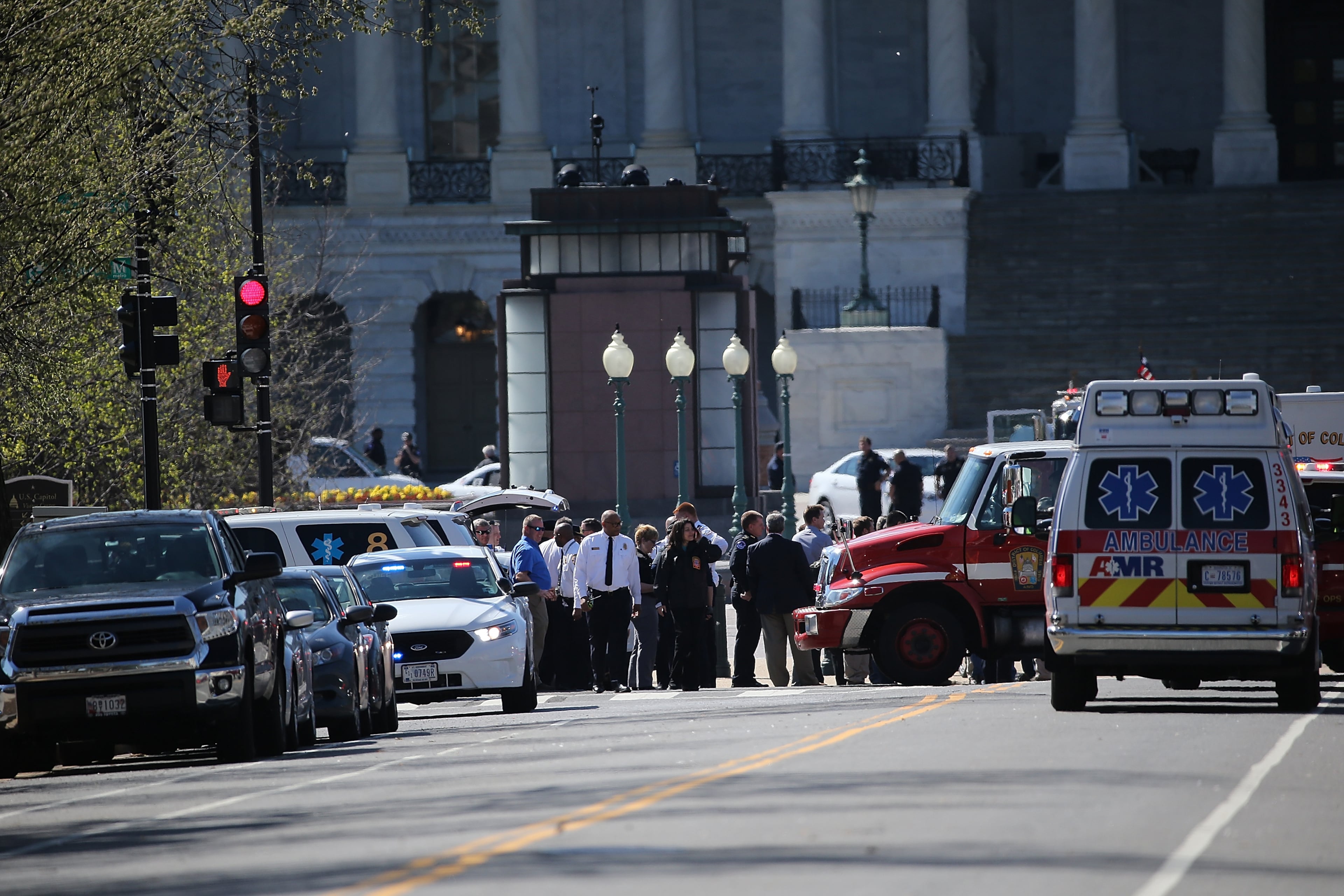 Emergency personnel and law enforcements officers gather outside the U.S. Capitol after at least one person was shot in the Capitol Visitor Center March 28, 2016 in Washington, DC. The Capitol was placed in "lock down" following the shooting. (Photo by Win McNamee/Getty Images)