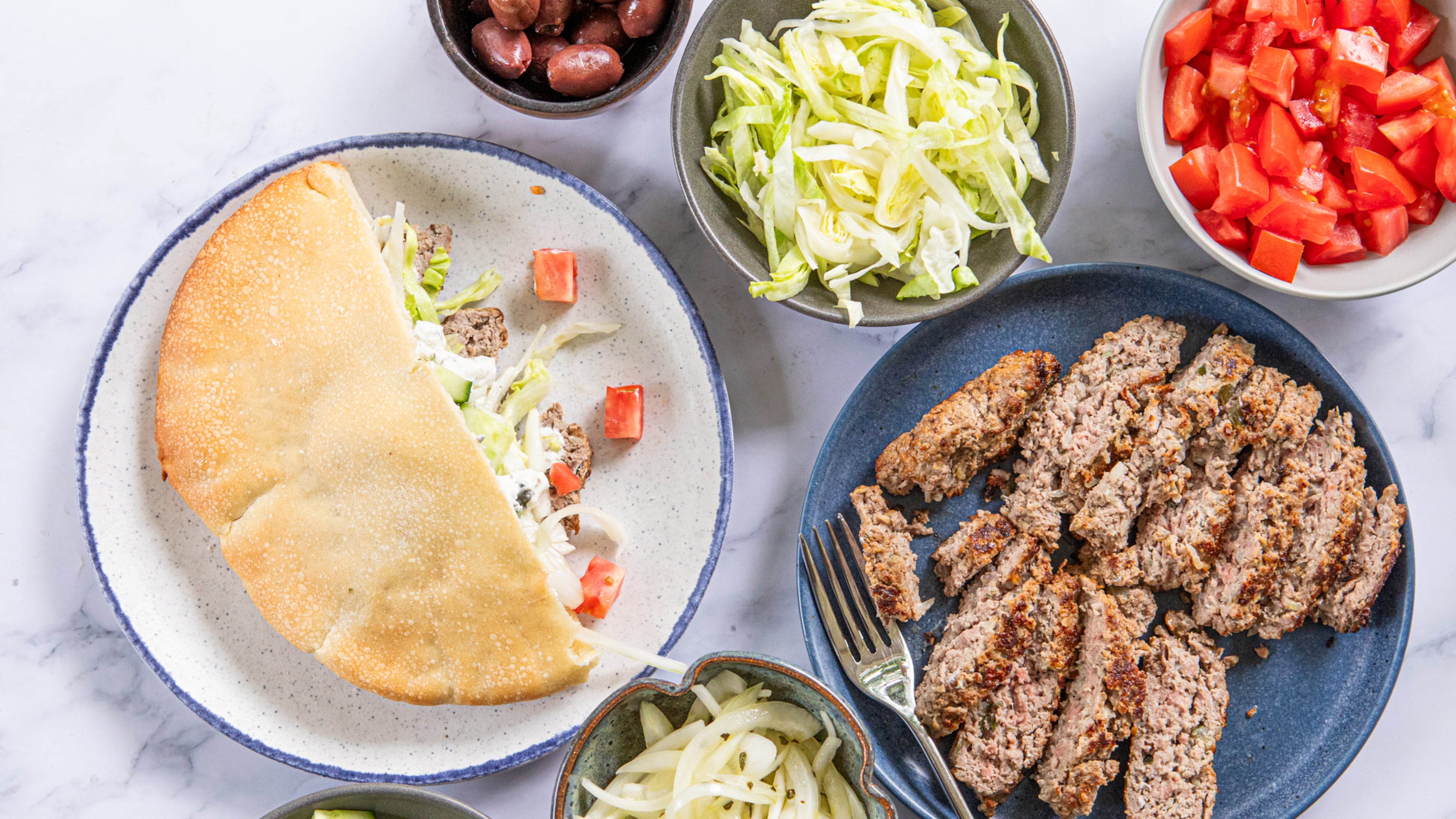 Quick Lamb Gyros are a crowd-pleasing, DIY dinner that comes together quickly. (Aaliyah Man for the AJC/food styling by Kate Williams)