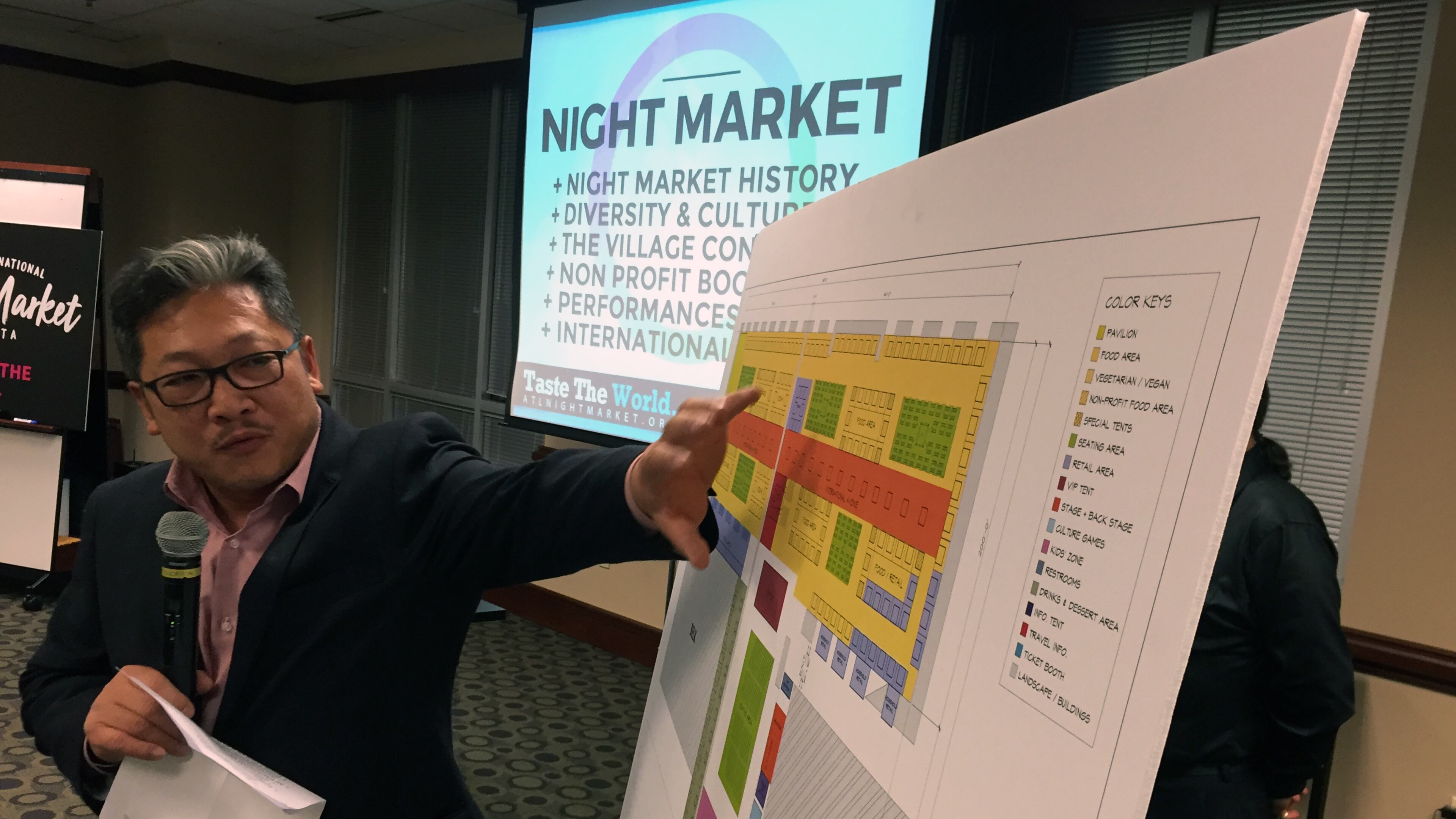 David Lee points out the proposed lay out for the Atlanta International Night Market at Gwinnett Place Mall in Duluth at a Gwinnett Chamber of Commerce presentation in January, 2017.