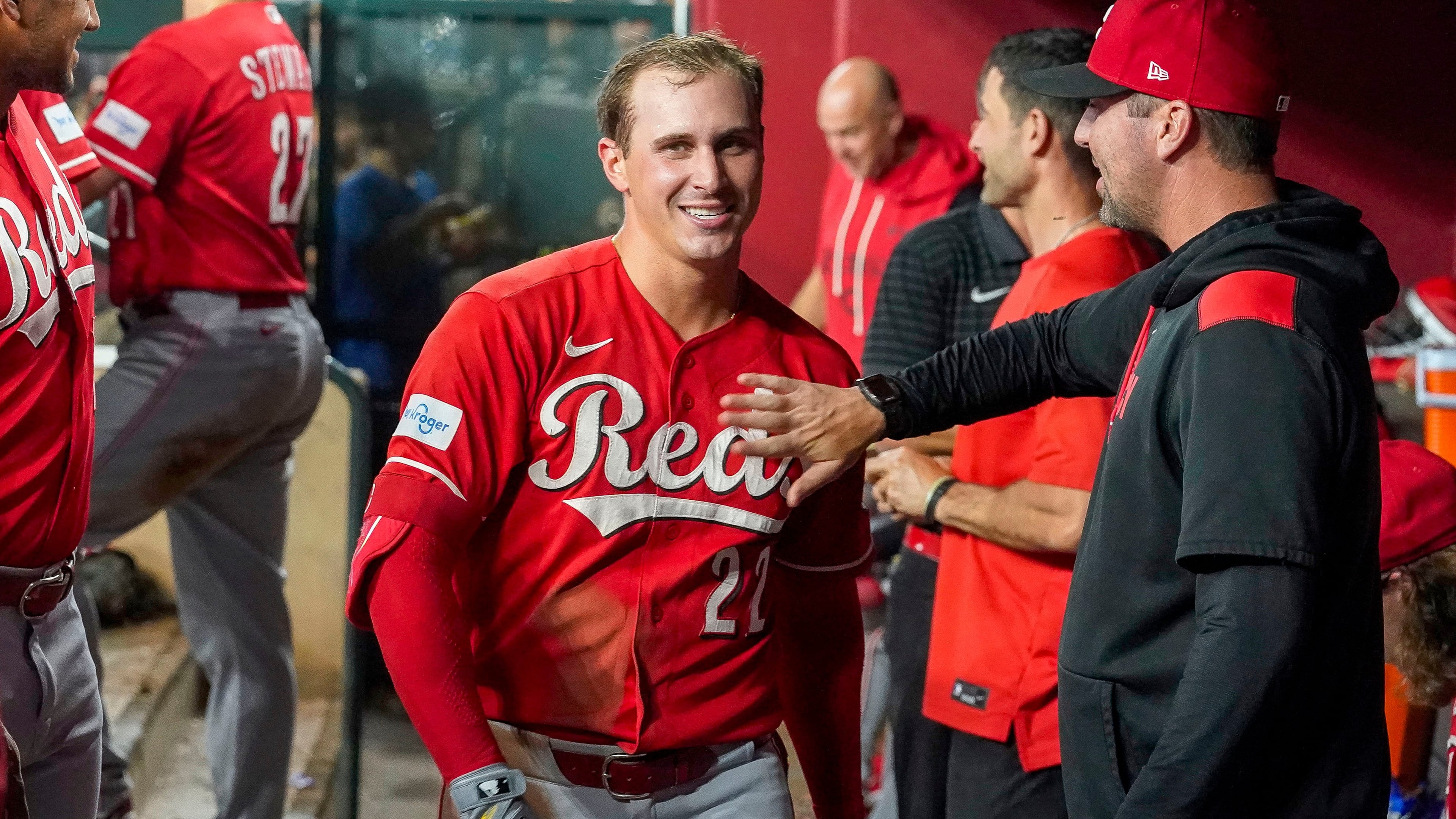 Cincinnati Reds' JJ Bleday, is all smiles after hitting a home run to complete hitting for the cycle during the sixth inning of a baseball game against the Arizona Diamondbacks, Saturday, Aug. 22, 2026, in Phoenix. (AP Photo/Darryl Webb)