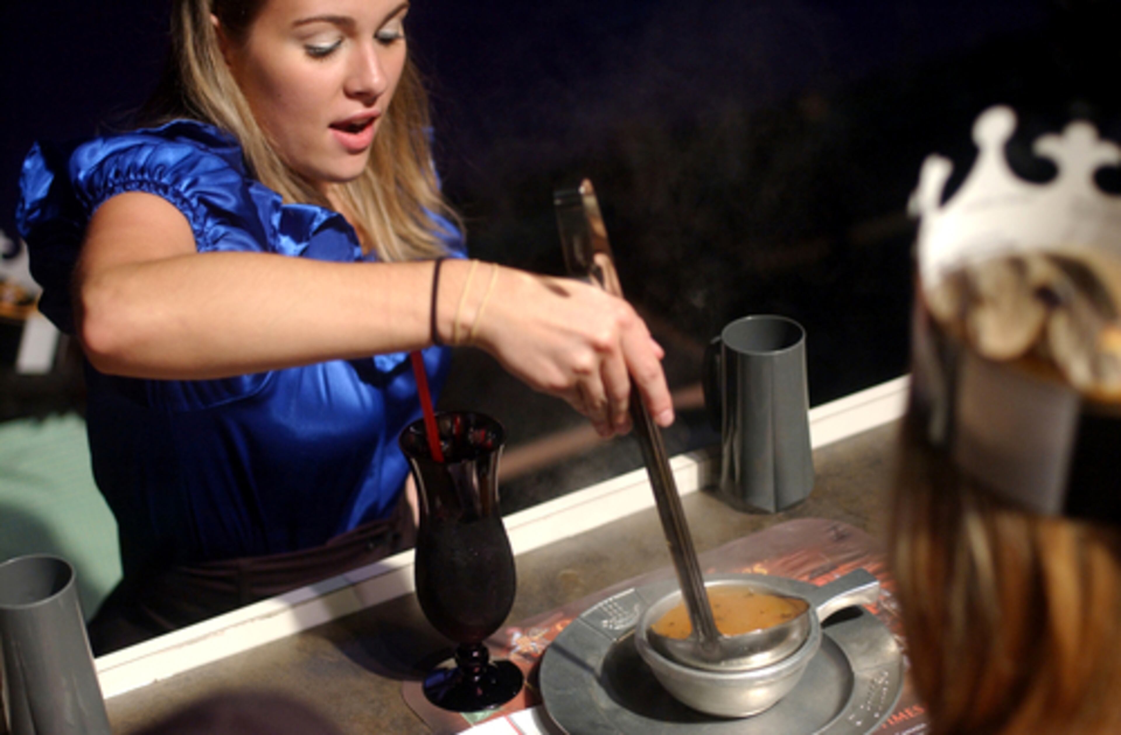 Diners can eat something exotic like "dragon tail soup," or stick to food they know like roasted chicken and spare ribs.