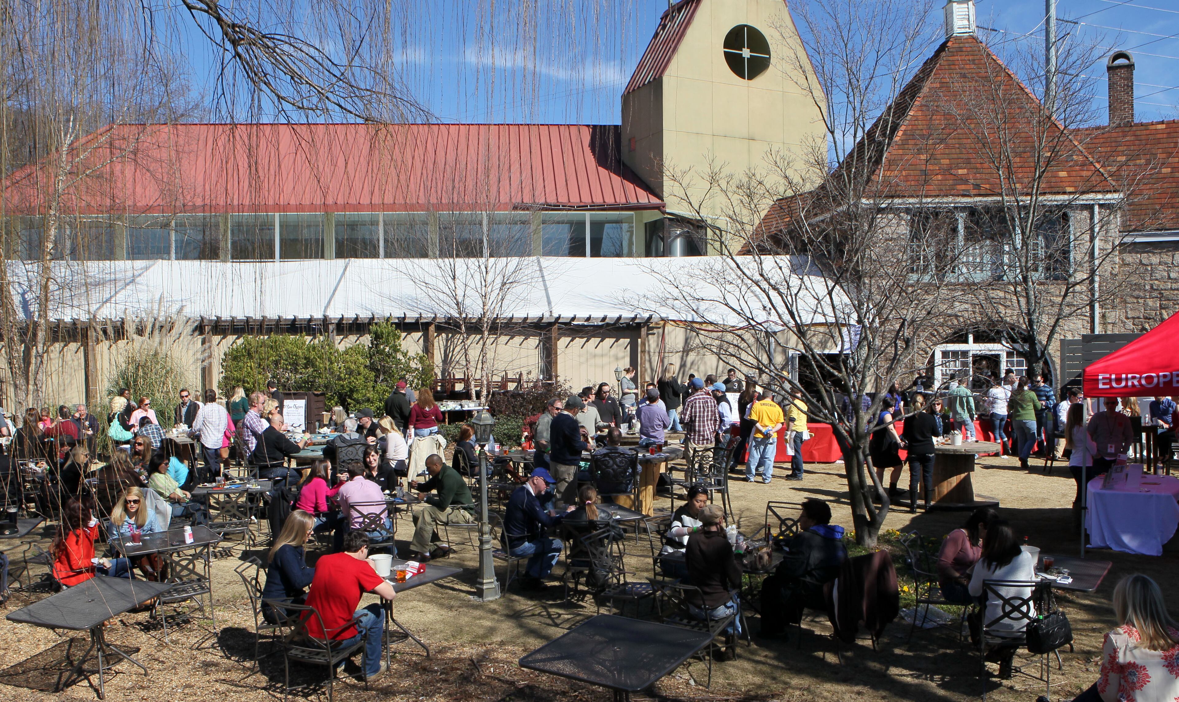 Spiral Entertainment hosted Oysterfest at Park Tavern at Piedmont Park in Atlanta Saturday, Feb. 9, 2013. Thousands were expected to attend the day long festival, which featured live music from local bands, DJs, cold beer and other beverages, and fresh, raw, steamed and fried oysters with plenty of cocktail sauce and crackers. Raw oysters were flown in fresh Connecticut (Blue Point Oysters) and Prince Edward Island (Malpeque Oysters) and huge fried and steamed oysters from straight from the Texas coast.