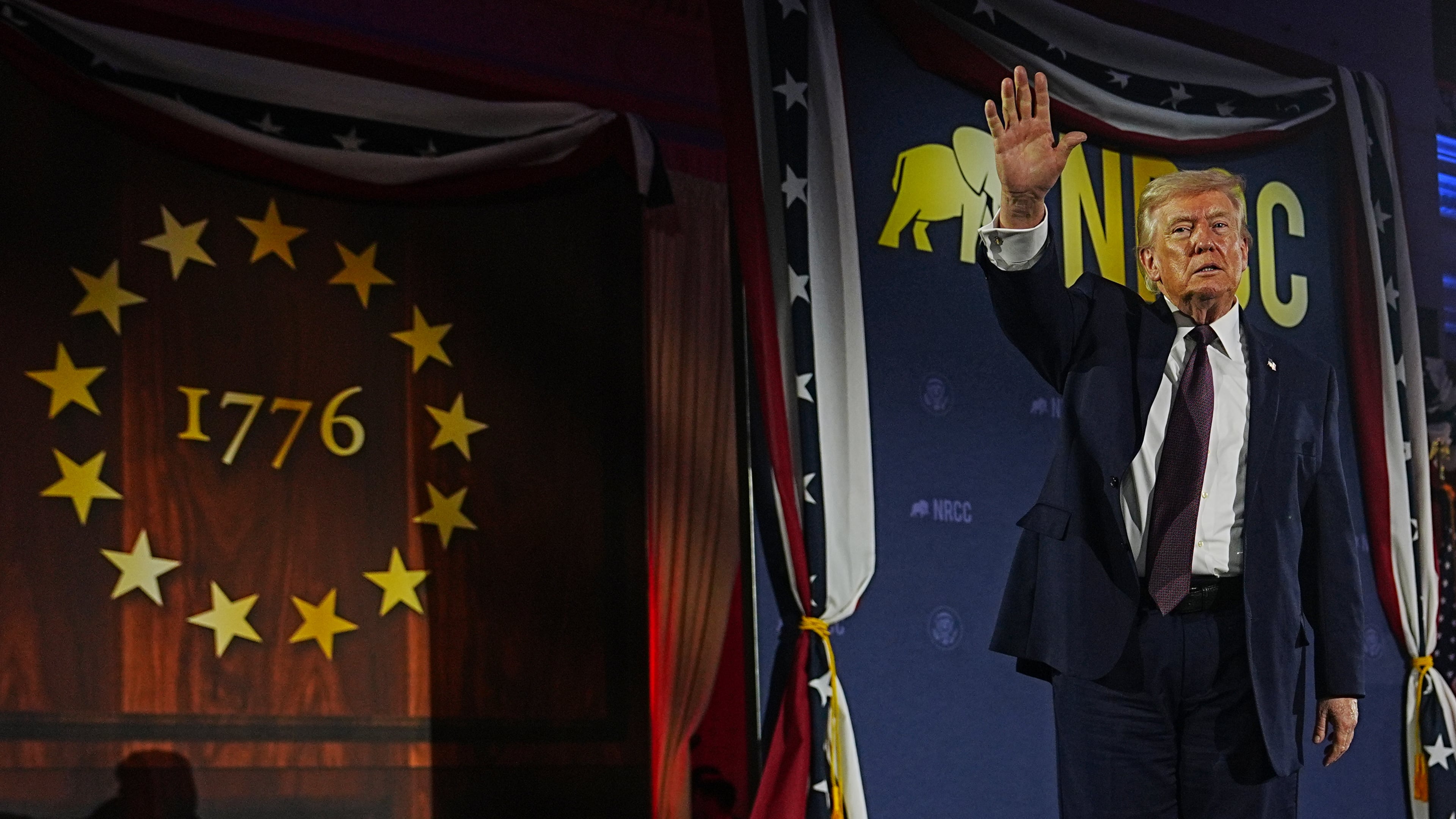 President Donald Trump waves after speaking at the National Republican Congressional Committee's (NRCC) annual fundraising dinner, Wednesday, March 25, 2026, at Union Station in Washington. (AP Photo/Julia Demaree Nikhinson)