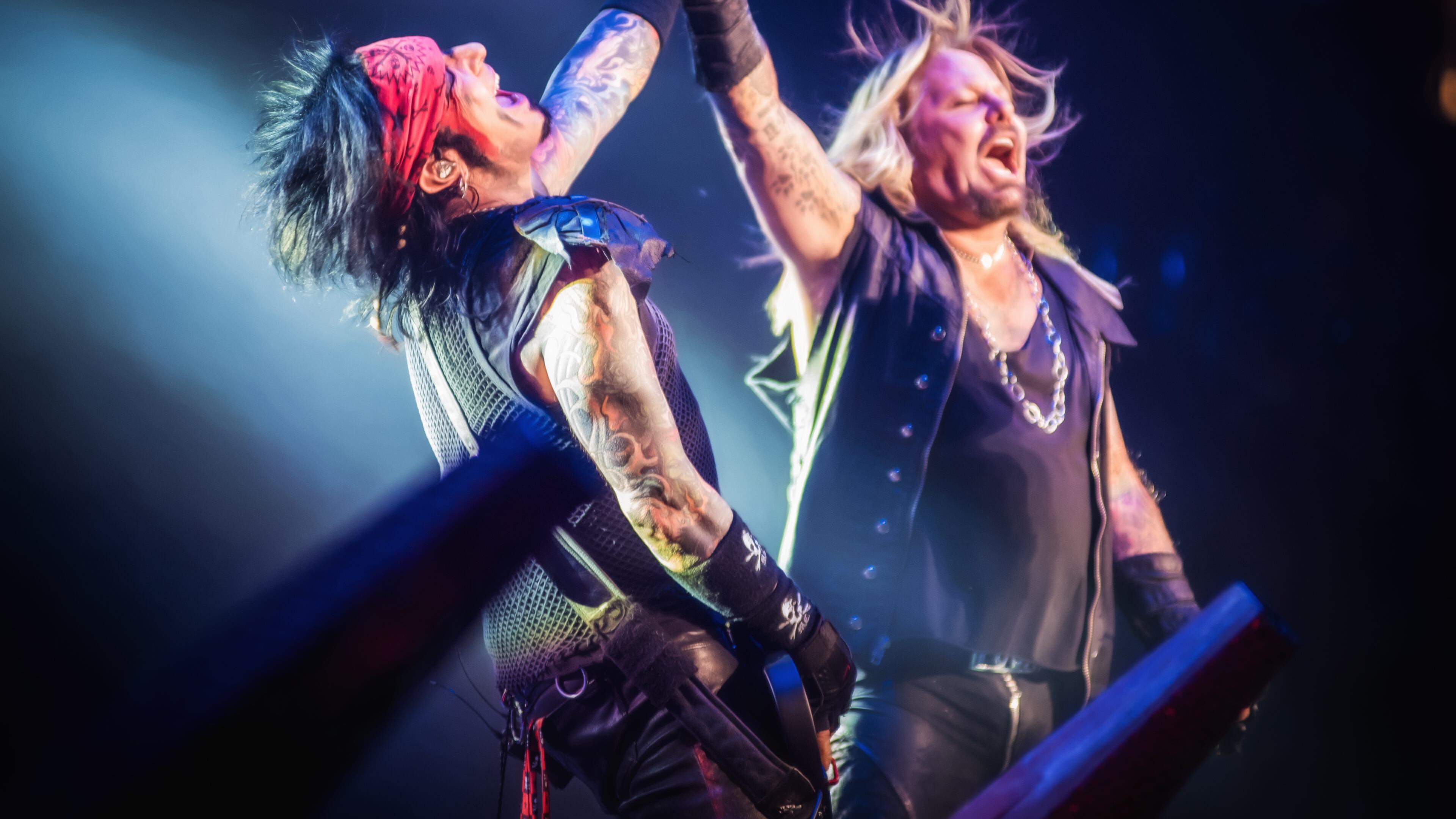 Nikki Sixx and Vince Neil share a moment. Photo: Dustin Jack.