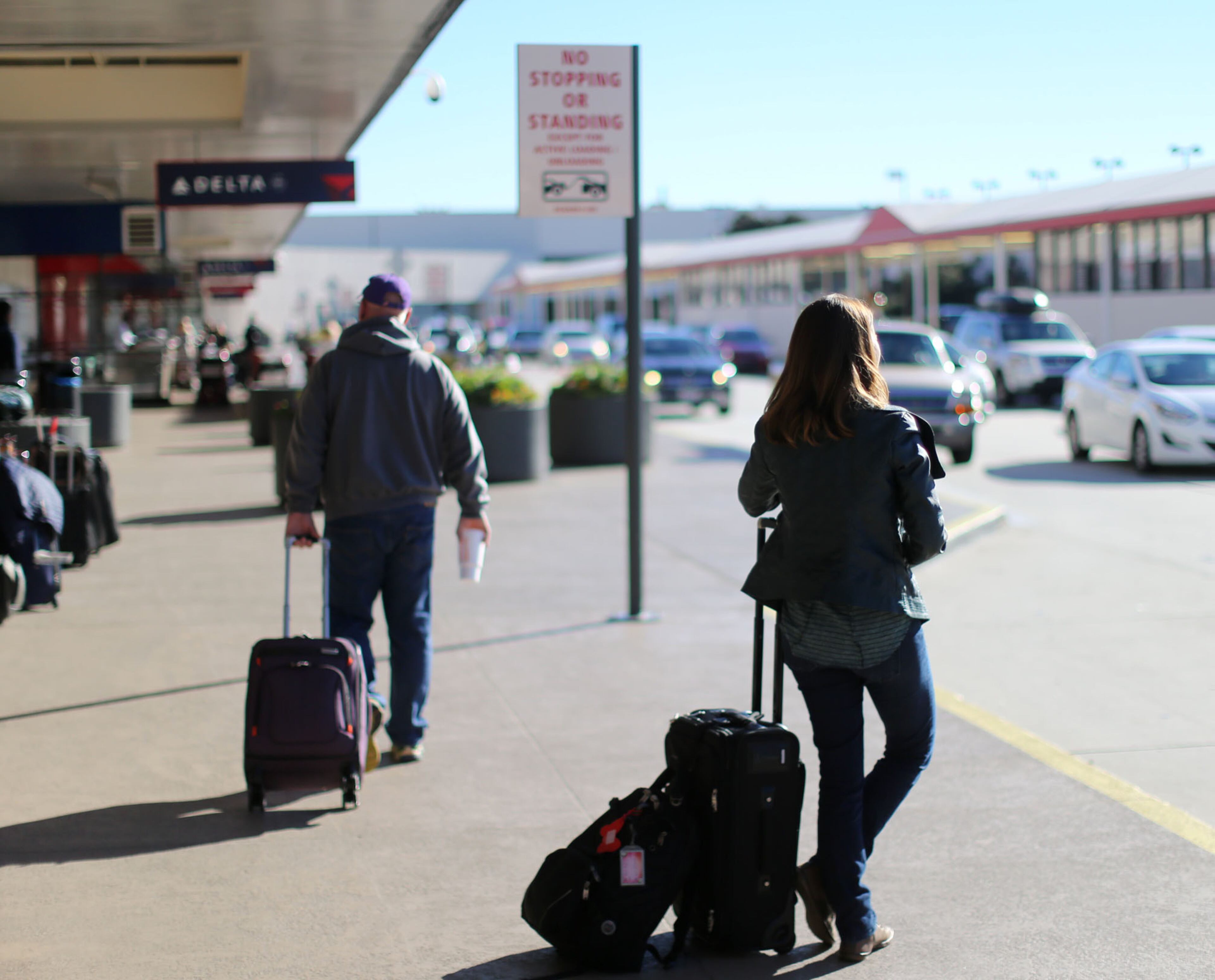 Arriving passengers wait for transportation on Nov. 20, 2015 at Hartsfield-Jackson Atlanta International Airport, the world's busiest airport, which is forecasting some of the biggest increases in traffic it has seen in years. BOB ANDRES / BANDRES@AJC.COM