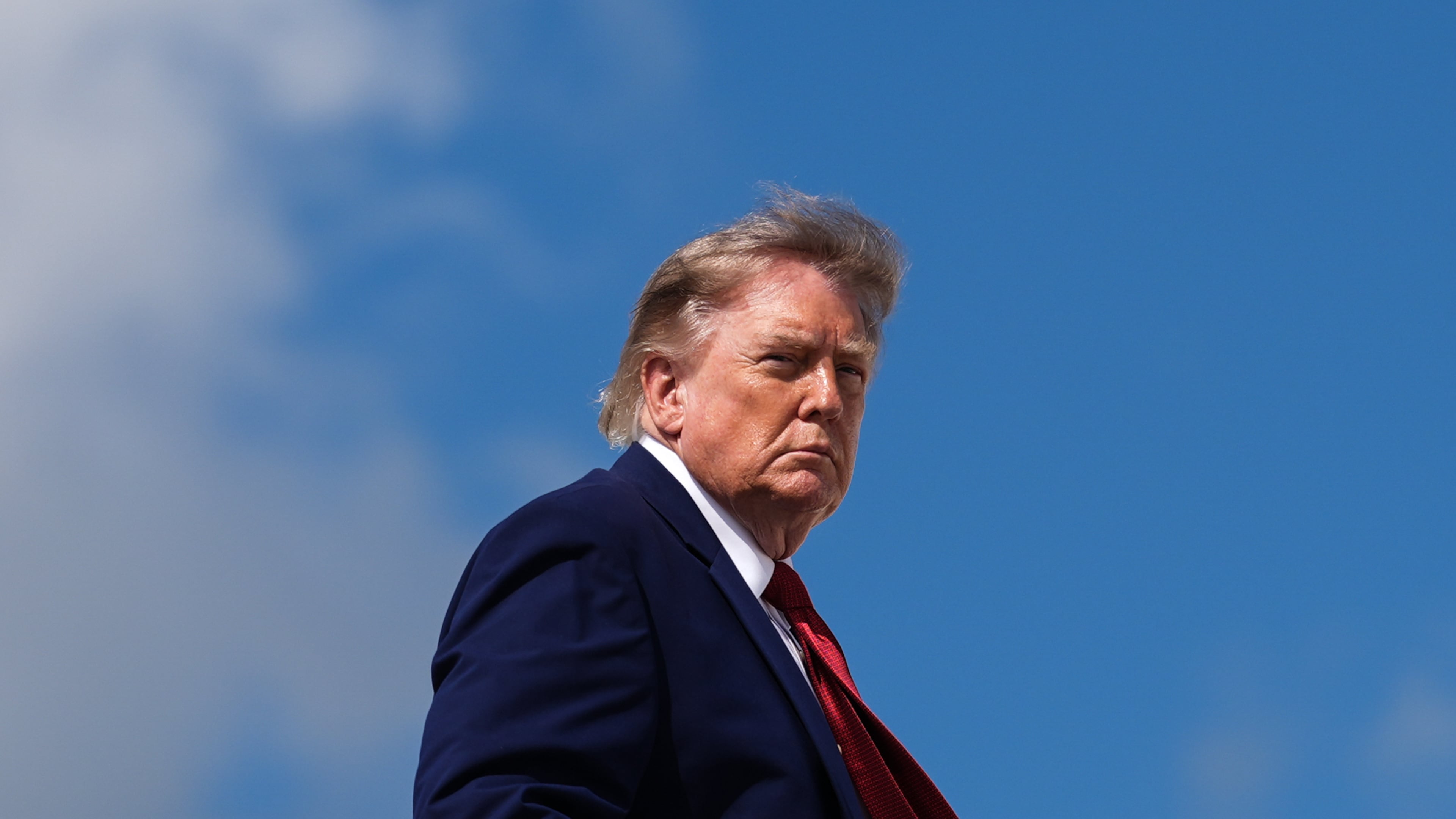 FILE - President Donald Trump boards Air Force One, Aug. 7, 2026, at Joint Base Andrews, Md. (AP Photo/Julia Demaree Nikhinson, File)