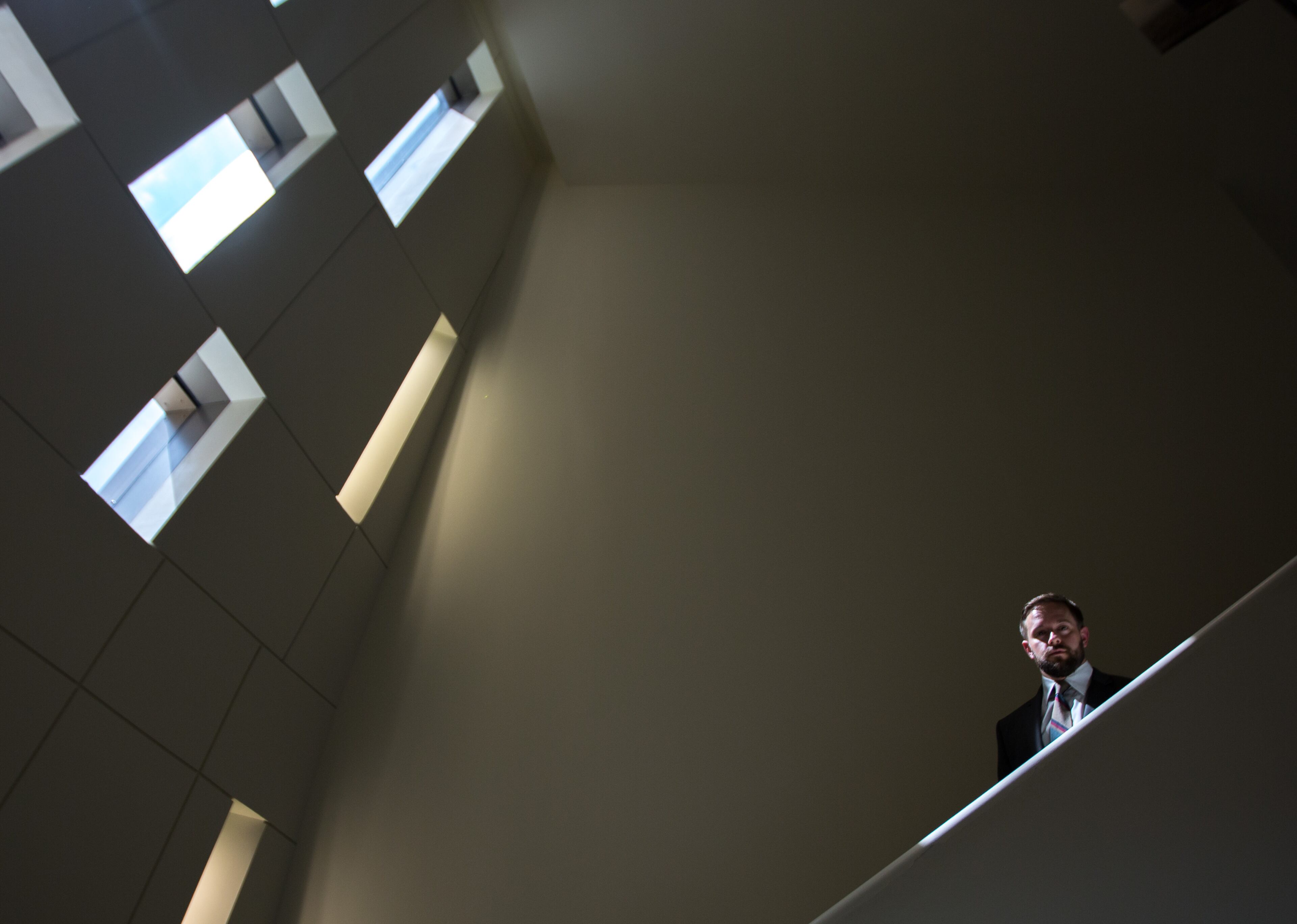 Ryan Roemerman, interim executive director for the LGBT Institute, poses for a portrait at the Center for Civil and Human Rights, Tuesday, Sept. 1, 2015, in Atlanta. Leaders of an Atlanta museum want the space focused on modern and historic civil rights to contribute to a national push to ensure LGBT rights, particularly in southern states. (AP Photo/Branden Camp)