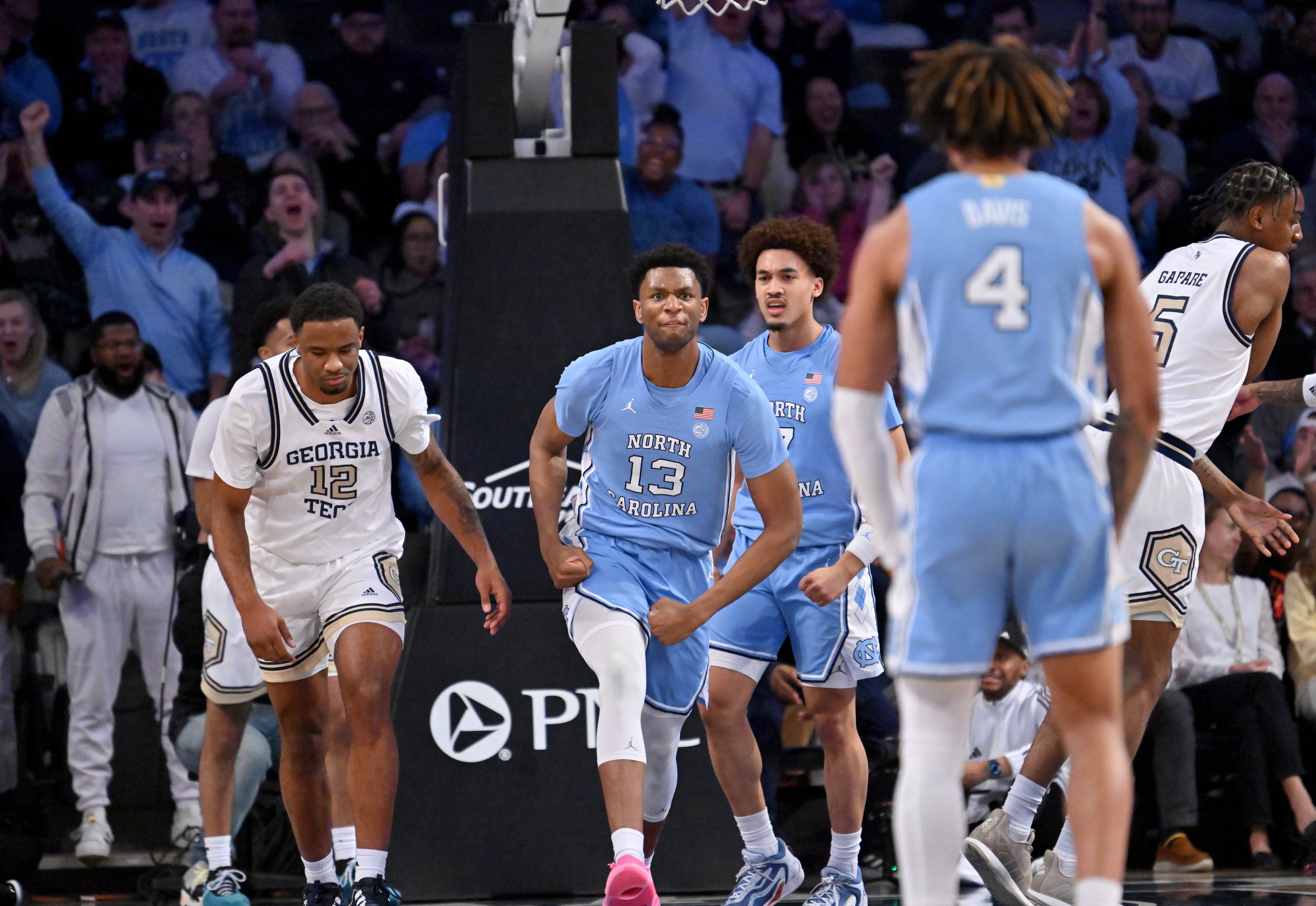 North Carolina forward Jalen Washington (13) reacts after dunking the ball during the first half of an NCAA college basketball game at Georgia Tech’s McCamish Pavilion, Tuesday, January 30, 2024, in Atlanta. (Hyosub Shin / Hyosub.Shin@ajc.com)