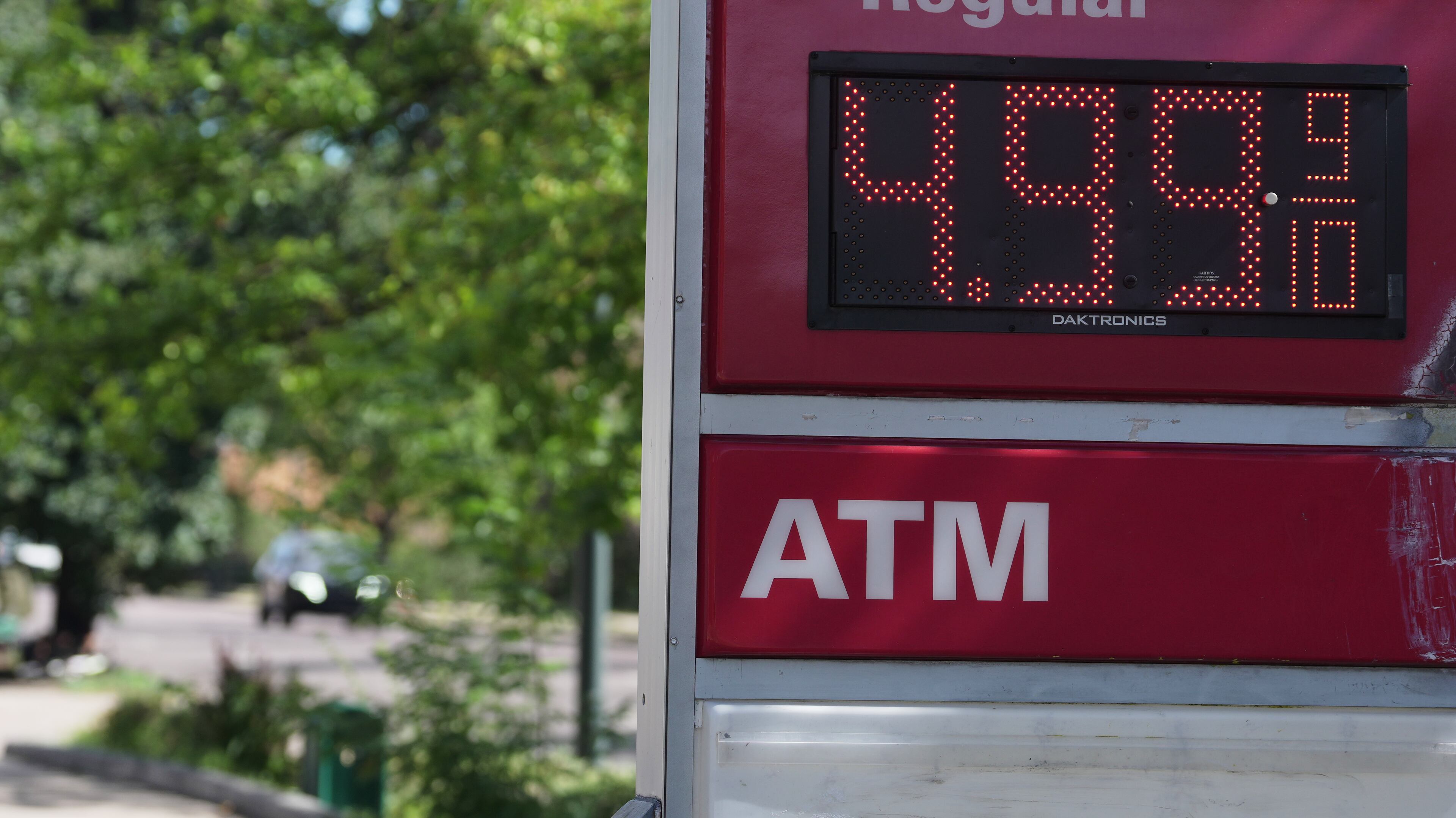 The per-gallon price for regular unleaded fuel is displayed electronically on a sign outside a Conoco gasoline station Wednesday, Sept. 9, 2026, in Denver. (AP Photo/David Zalubowski)