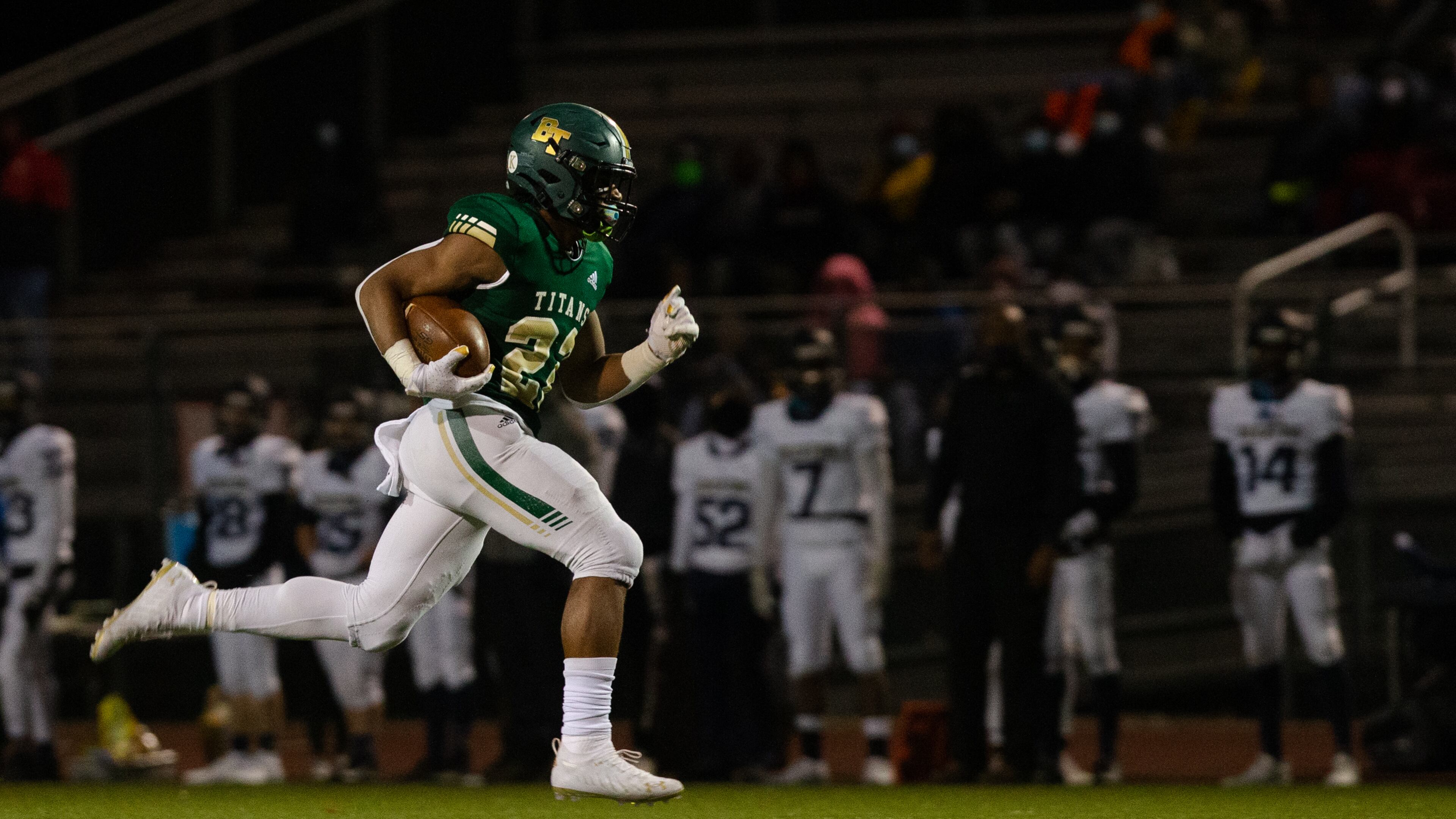 Justice Haynes (22) sophomore running back for Blessed Trinity, sprints to the end zone against Decatur High School during the second-round playoff game Friday, Dec. 4, 2020, in Roswell. Blessed Trinity won 44-0. (Christina Matacotta/For the AJC)