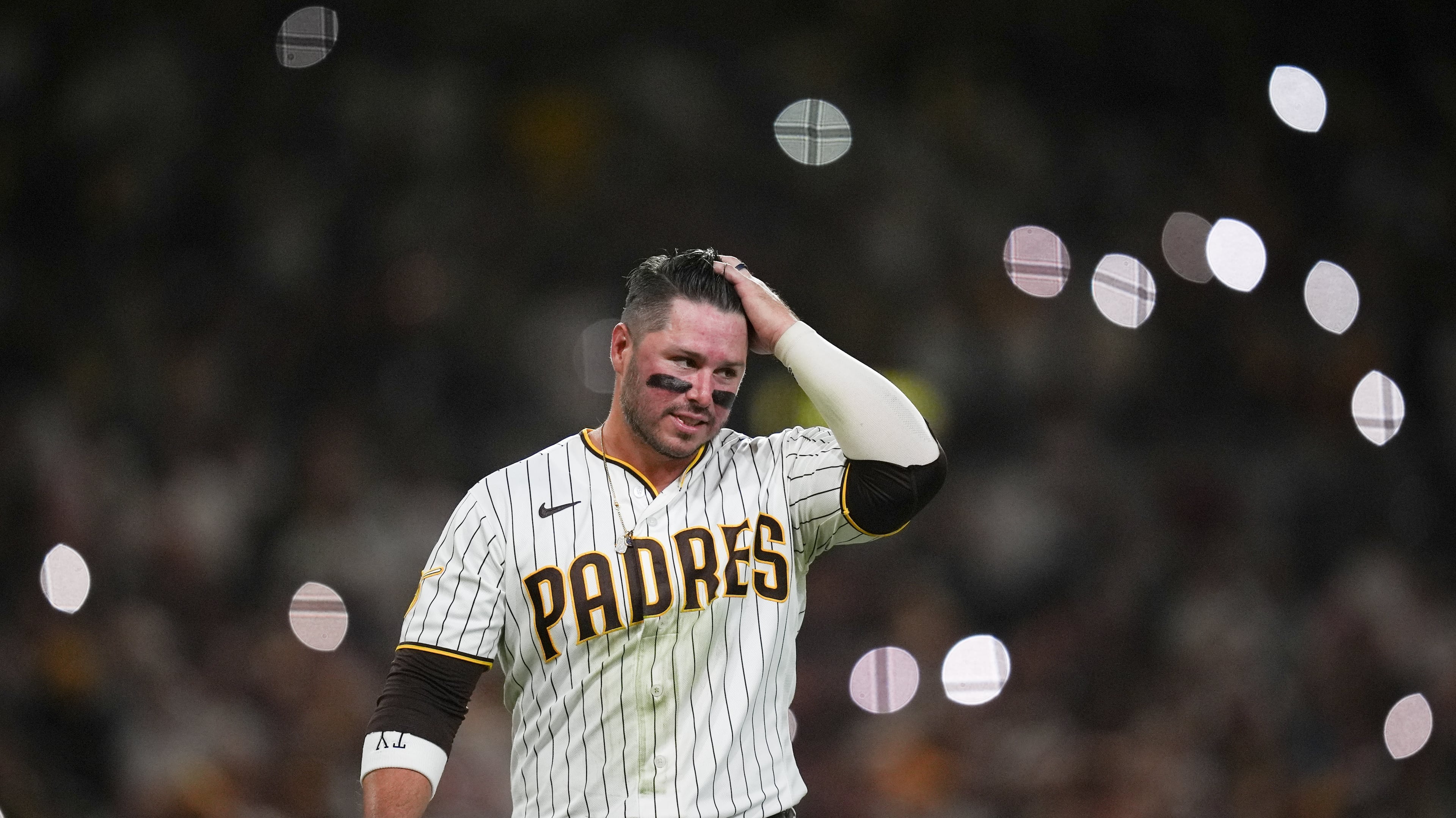 San Diego Padres' Ty France reacts after he was forced out by Milwaukee Brewers second baseman Brice Turang during the sixth inning in Game 4 of baseball's National League Division Series Wednesday, Oct. 7, 2026, in San Diego. (AP Photo/Gregory Bull)