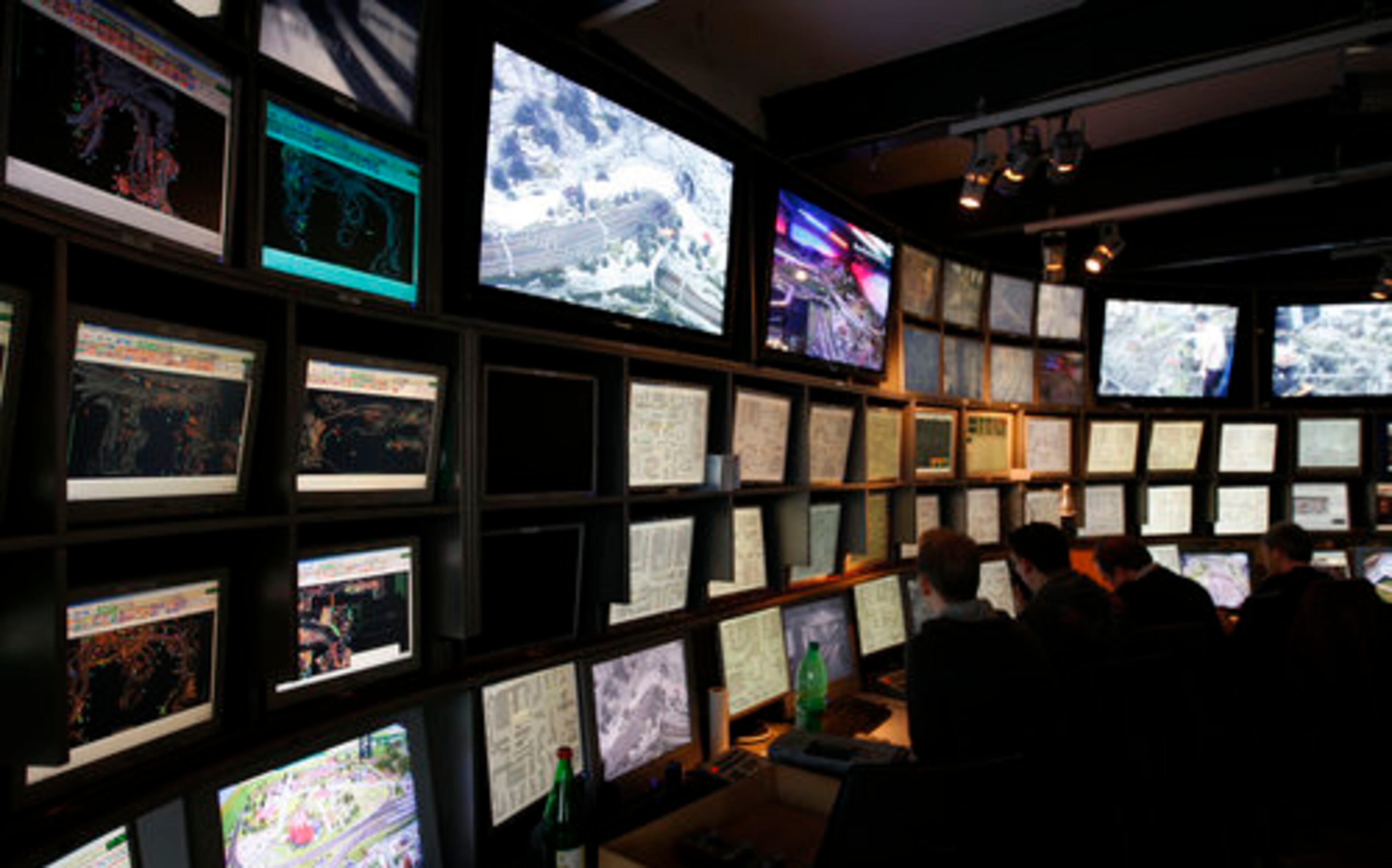EMPLOYEES MAN the control center that sends trains and vehicles through towns and fields via remote control. Push-button actions allow visitors to control some of Wunderland's movements too.