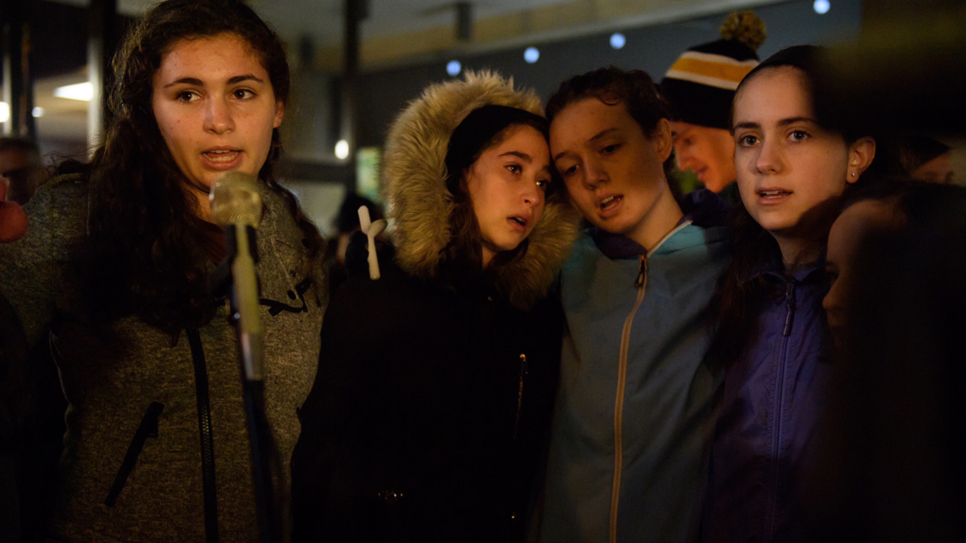 PITTSBURGH, PA - OCTOBER 27: People gather for a interfaith candlelight vigil a few blocks away from the site of a mass shooting at the Tree of Life Synagogue on October 27, 2018 in Pittsburgh, Pennsylvania. According to reports, at least 12 people were shot, 4 dead and three police officers hurt during the incident. The shooter surrendered to authorities and was taken into custody. (Photo by Jeff Swensen/Getty Images)