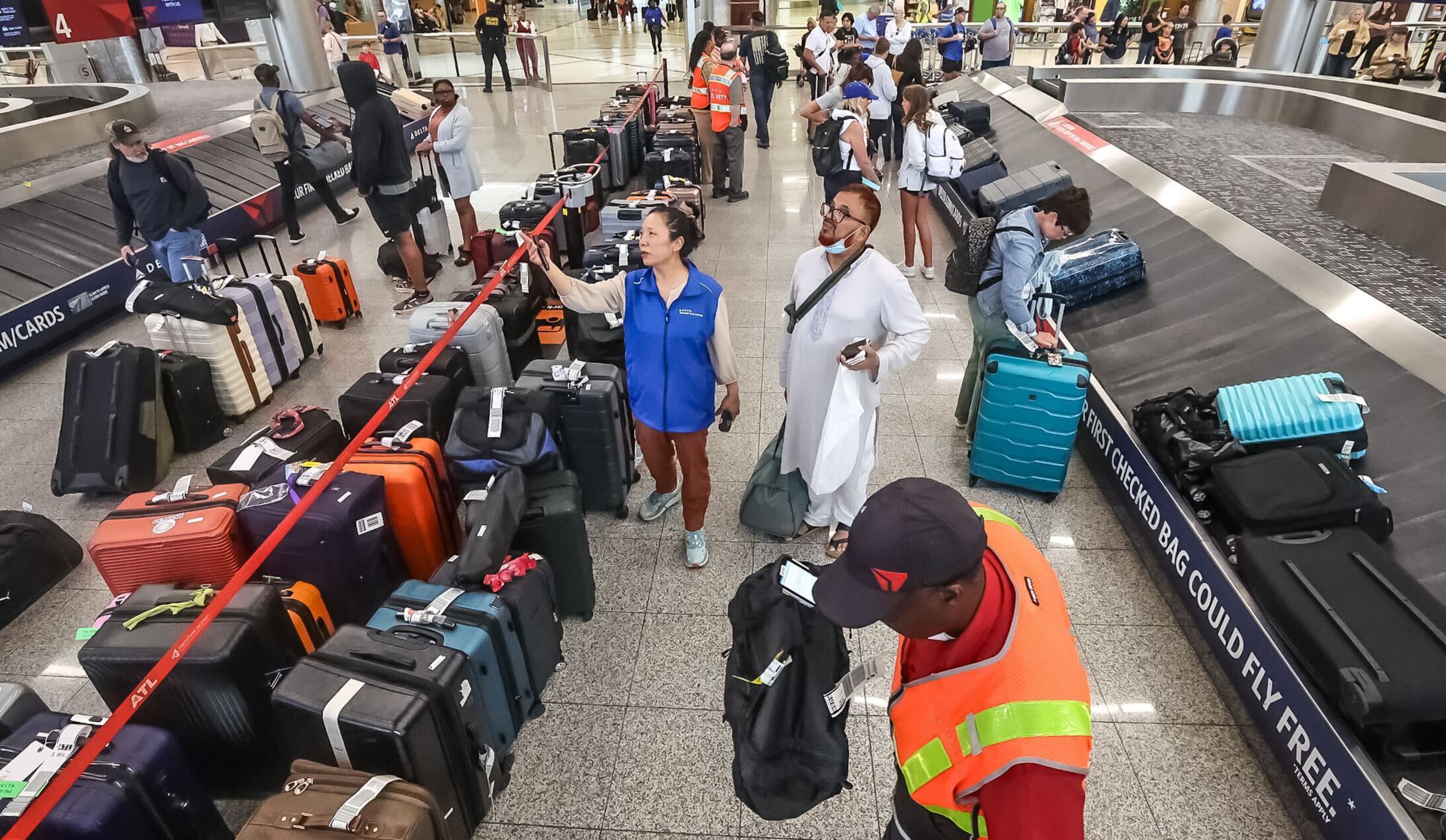 At Hartsfield-Jackson on Wednesday morning, baggage belonging to passengers whose flights got disrupted over the last several days remained lined up alongside baggage carousels.