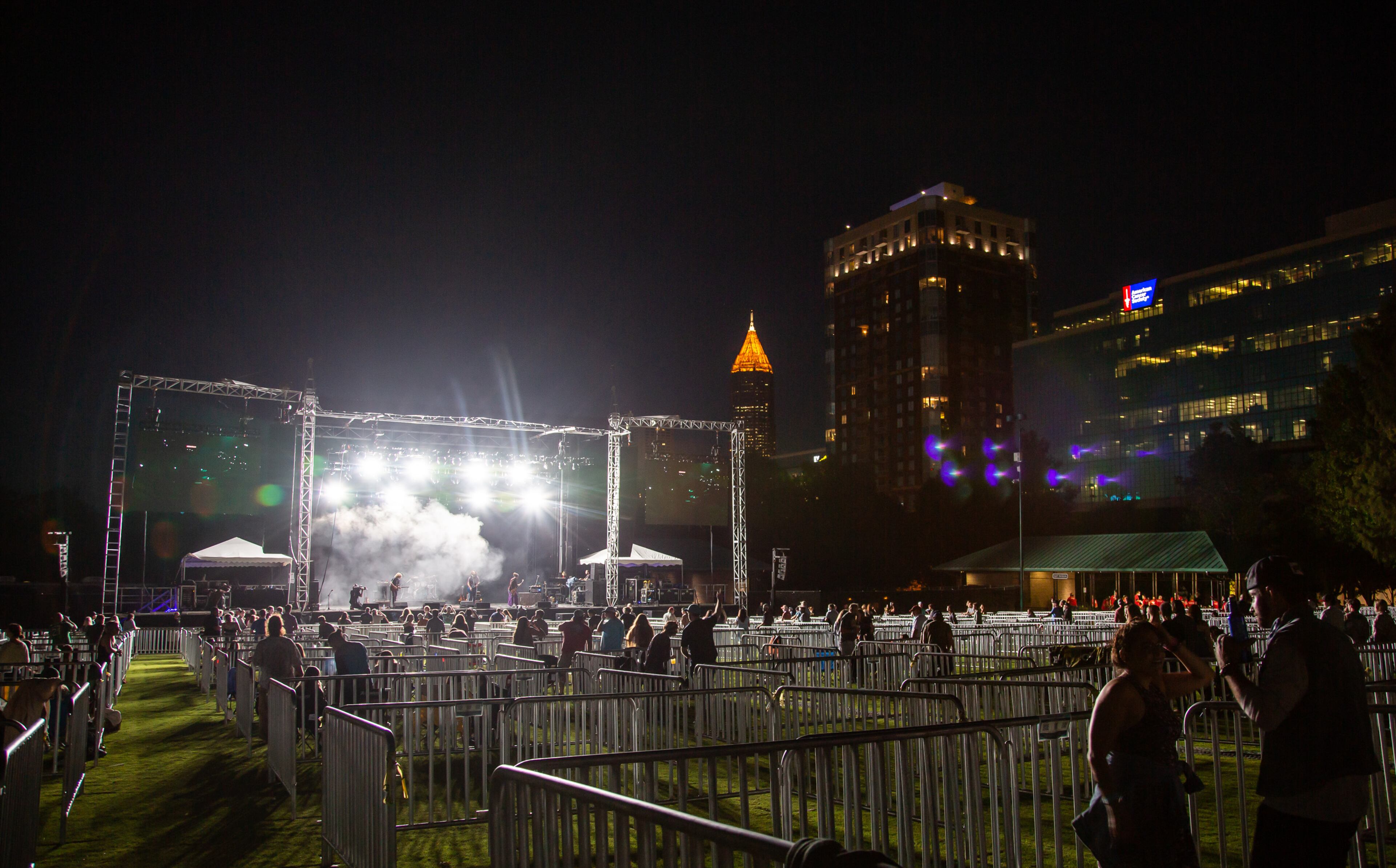Big Night Out, a three-night concert event, kicked off Friday, October 23, 2020, at Centennial Olympic Park. Pods help ensure social distancing for music fans, seen here enjoying Pigeons Playing Ping Pong. Photo: Ryan Fleisher for The Atlanta Journal-Constitution