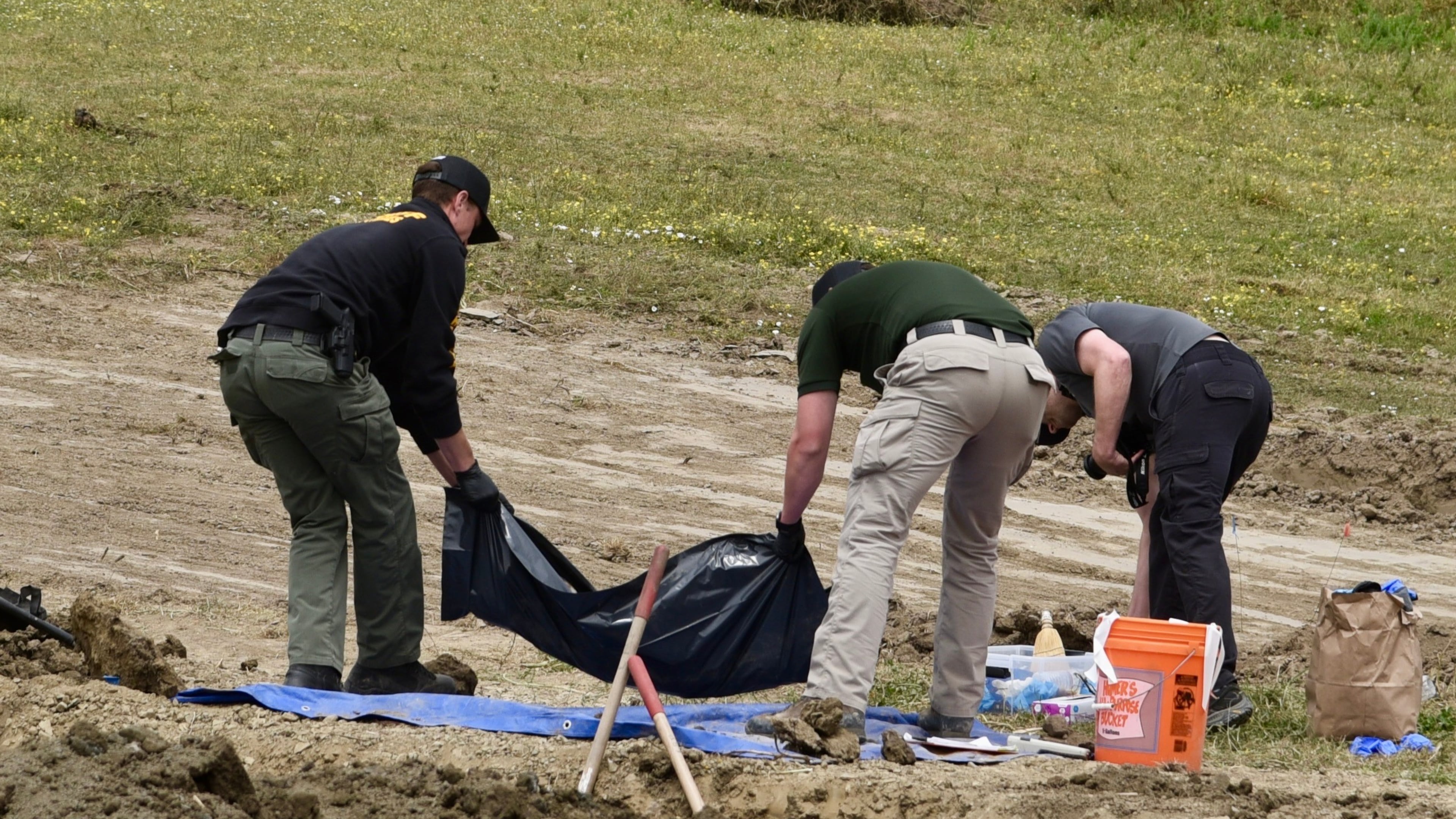 Investigators from the Humboldt County Sheriff's Office search the grounds of Miranda's Rescue Animal Sanctuary in Fortuna, Calif., June 24, 2026, where the remains of at least 117 dogs were found. (Ryan Burns/Lost Coast Outpost via P)