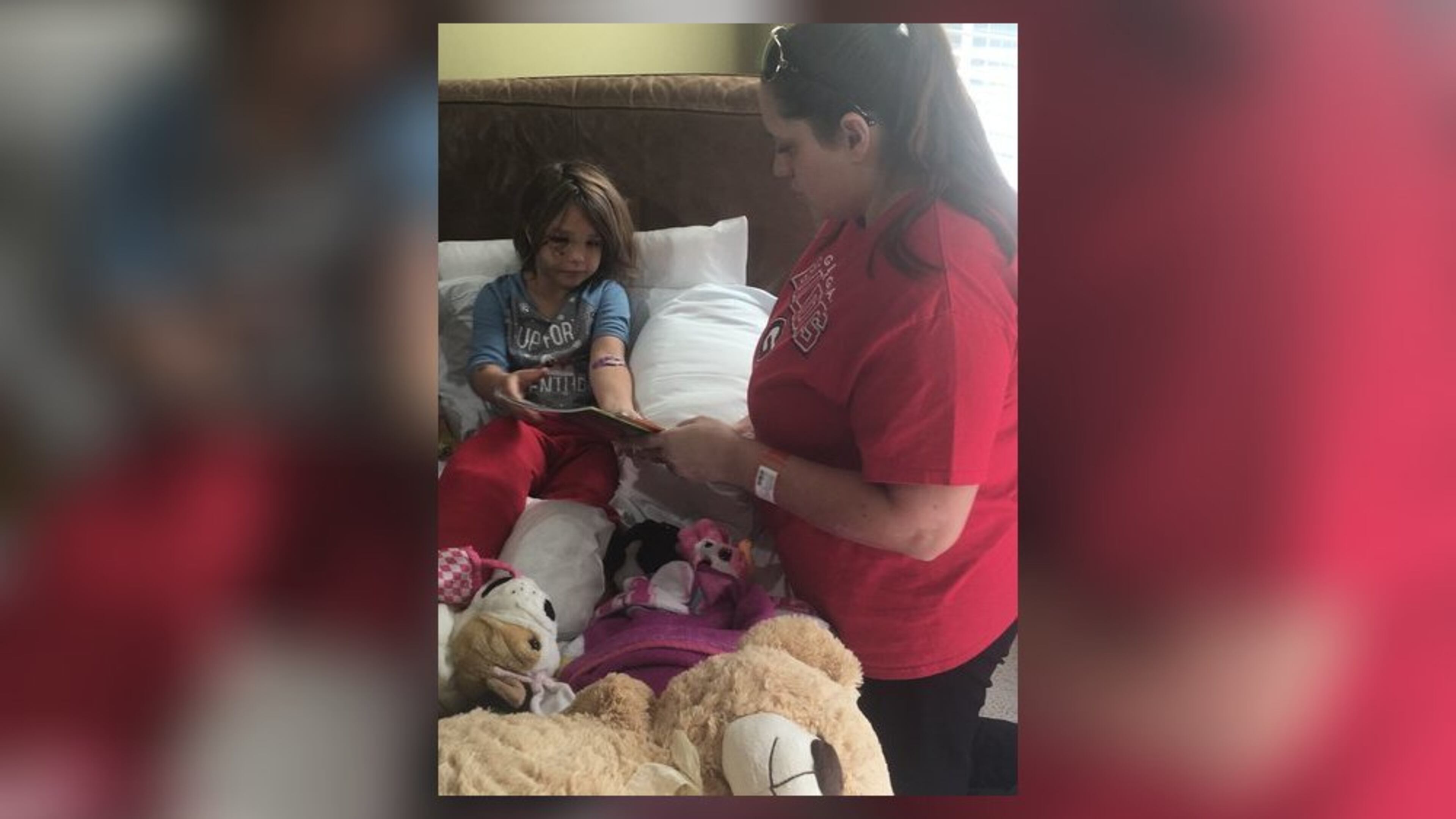 Nicole Cochran tends to daughter Lulu Pedrick, who suffered several injuries after a driver hit her after she got off a school bus.