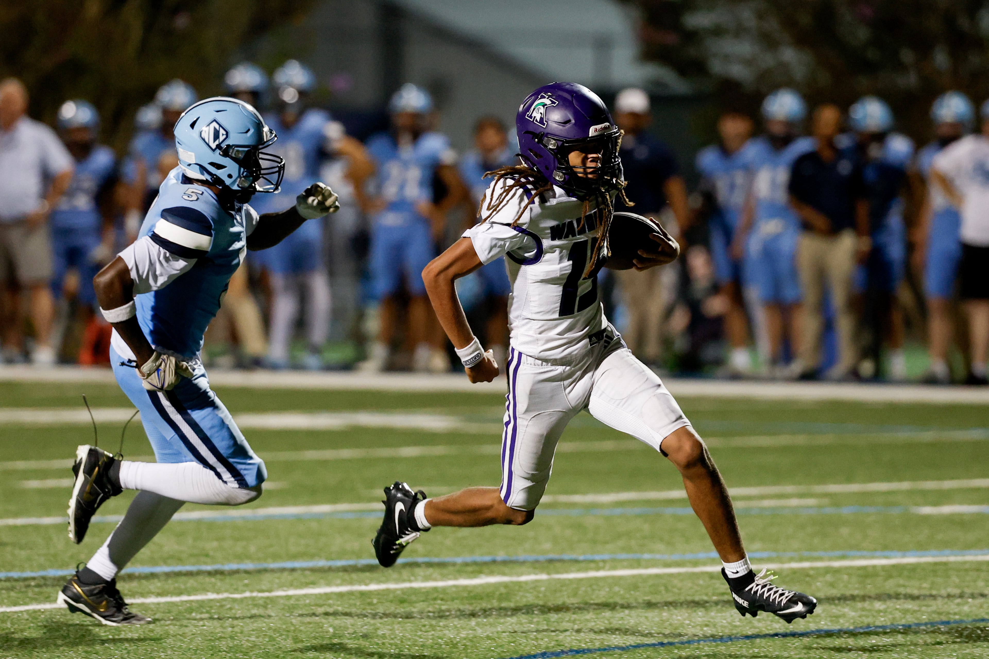 KIPP Atlanta’s Lawrence Moreland (right) breaks away from North Cobb Christian’s Mykah Wilson for a touchdown on Friday, Oct. 2, 2026, in Kennesaw. (Erik S. Lesser for the AJC)