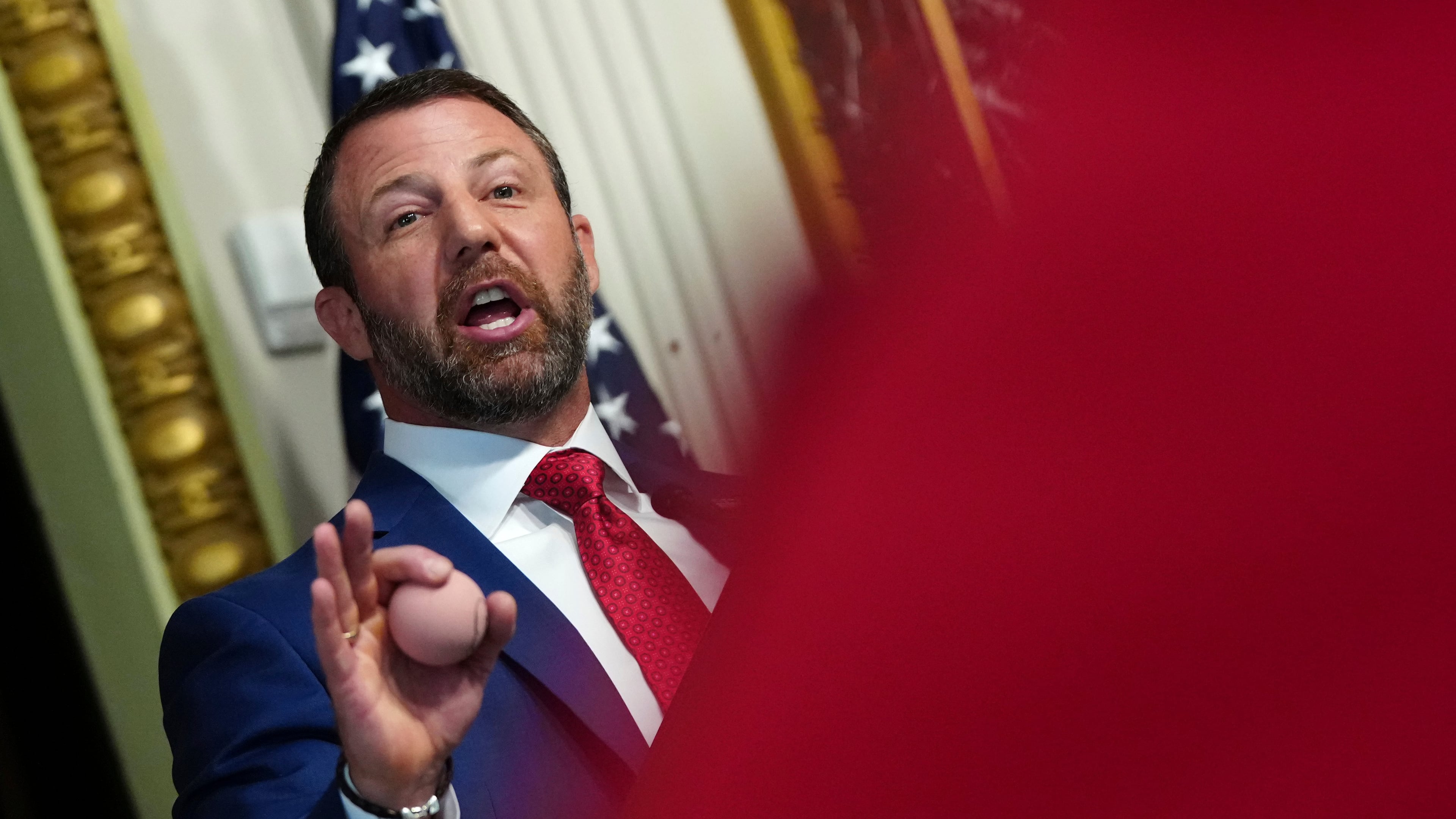 Homeland Security Secretary Markwayne Mullin speaks in the Indian Treaty Room at the Eisenhower Executive Office Building on the White House campus, Friday, July 17, 2026, in Washington. (AP Photo/Julia Demaree Nikhinson)