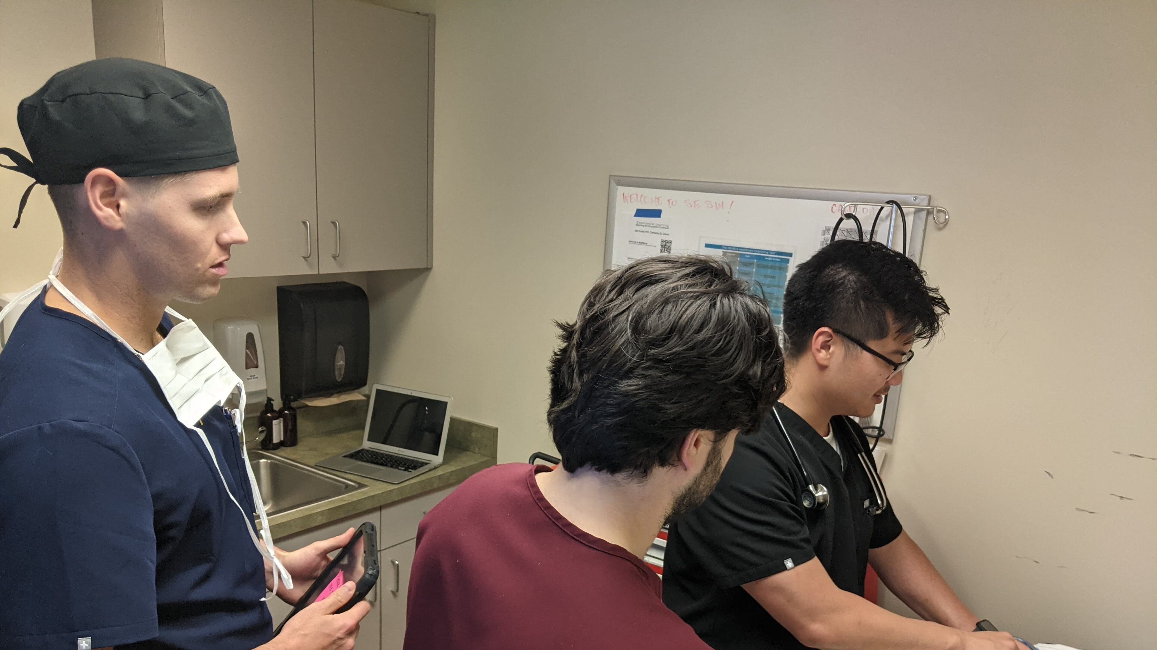 Students at the MCG Southeast Campus at Candler Hospital in Savannah. From the left, Brennen Bogdanovich, Seena Mansouri and Tommy Bui. (Photo Courtesy of Scott M. Larson/Provided by St. Joseph's/Candler)