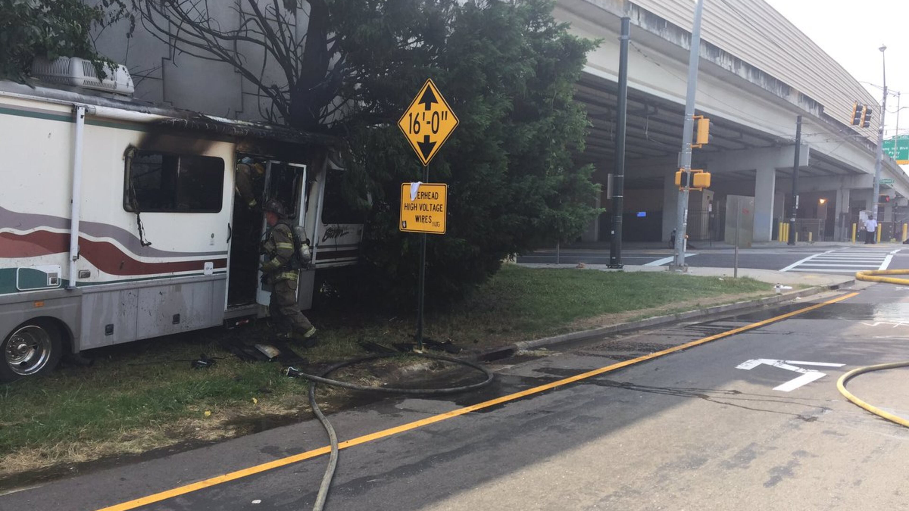 Edgewood Avenue was blocked for a while in both directions Thursday afternoon after an RV crashed and caught fire. (Credit: Atlanta Fire Department)