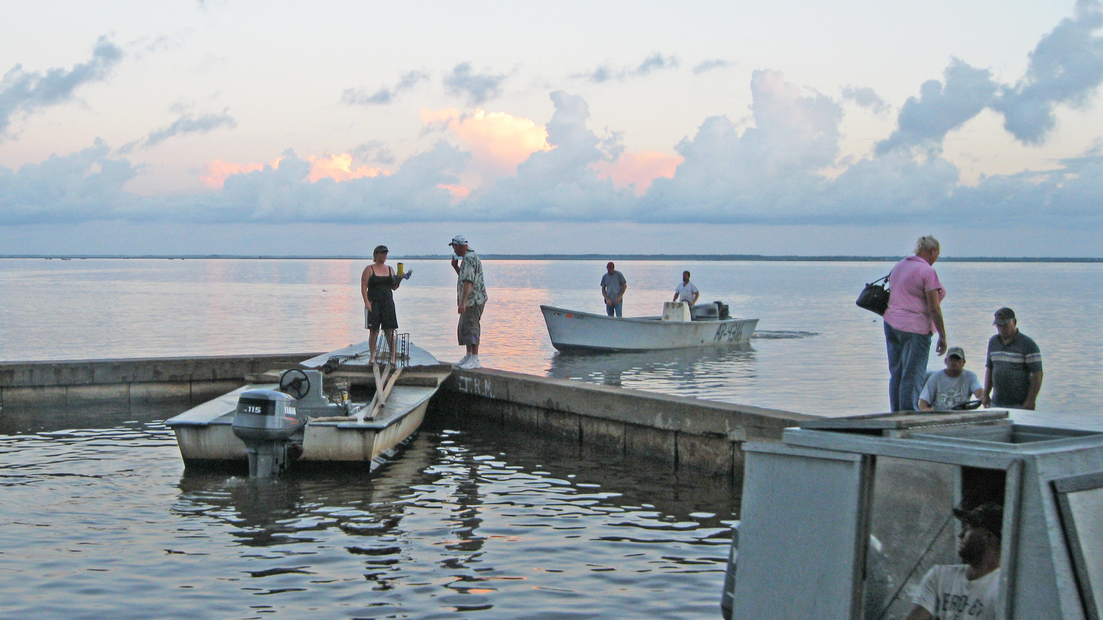 Oystermen head out from Eastpoint, Fla. for a day of fishing on the Apalachicola Bay. DAN CHAPMAN / DCHAPMAN@AJC.COM