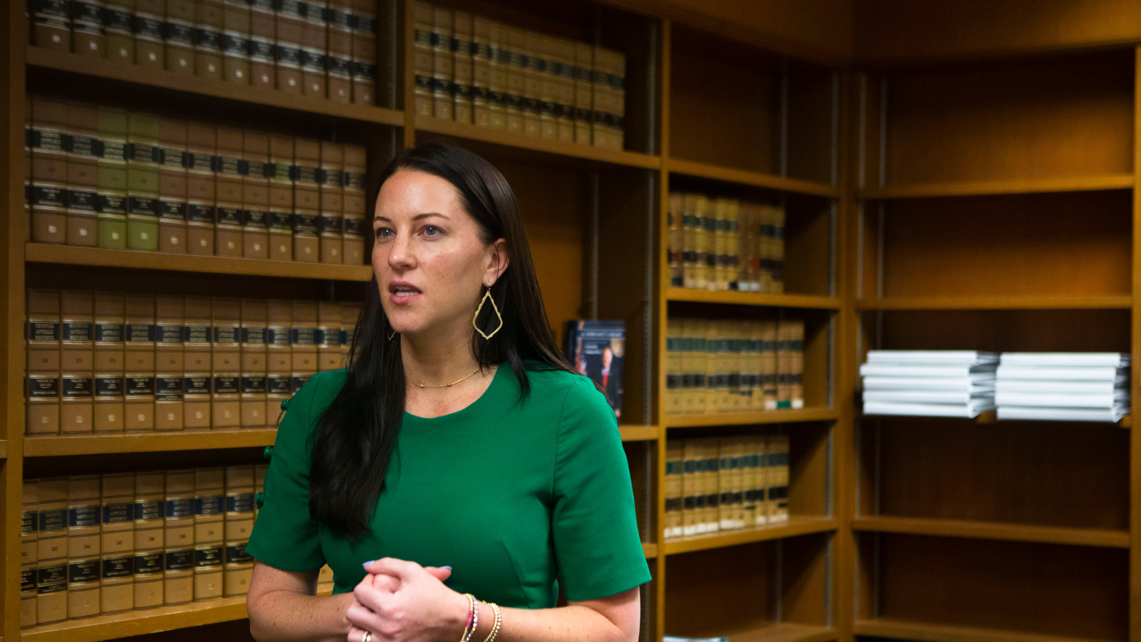 Prosecutor Cara Convery talks a reporter on Friday, August 5, 2022, in the State Law Building in Atlanta. Convery, the AG's gang unit section chief, discussed how she plans to tackle gangs in the state. CHRISTINA MATACOTTA FOR THE ATLANTA JOURNAL-CONSTITUTION