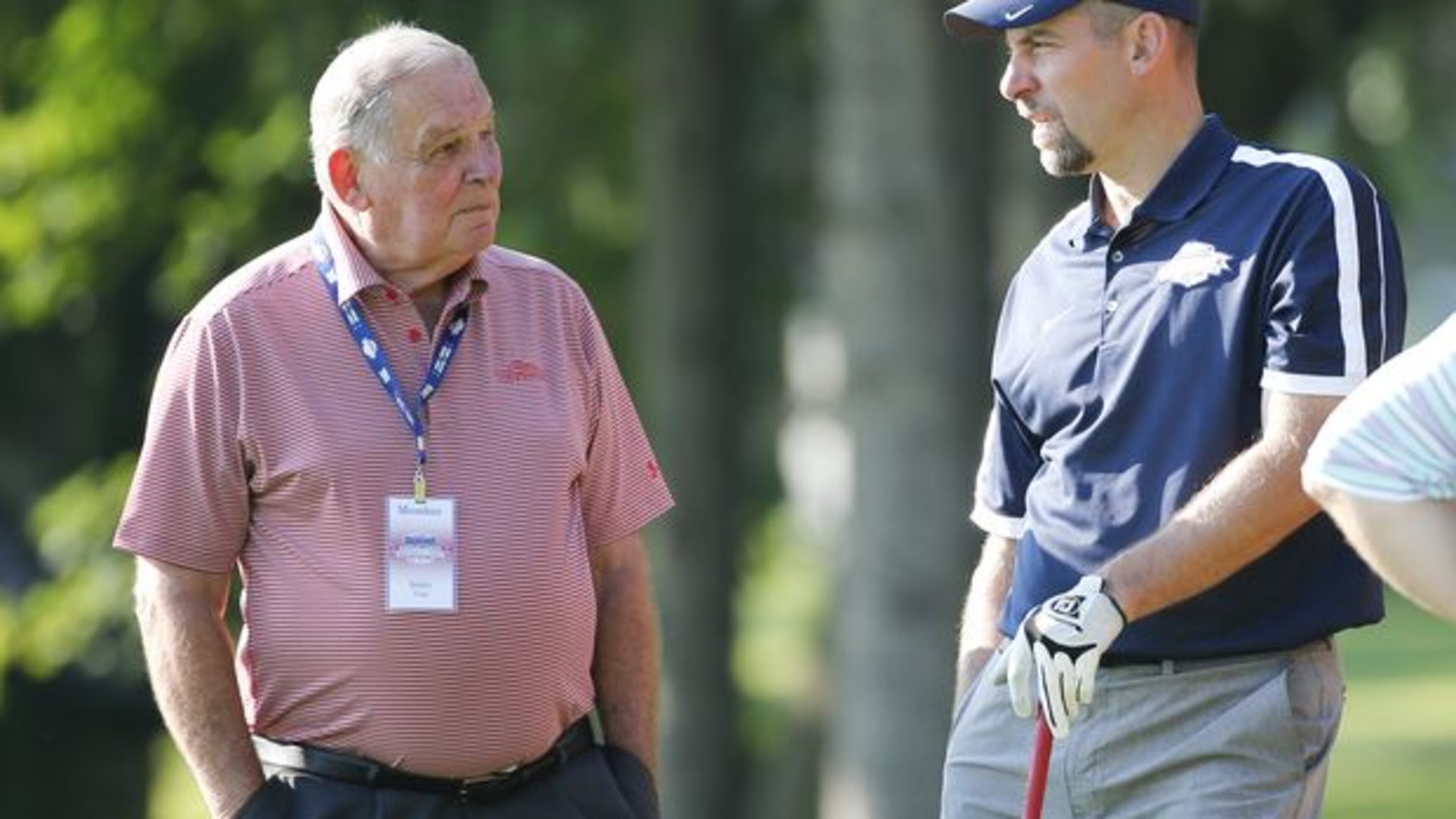 Fomer Braves manager and Class of 2014 Baseball Hall of Famer Bobby Cox (left) talks with Class of 2015 inductee John Smoltz during a Saturday golf tournament in Cooperstown, N.Y. (AP photo)