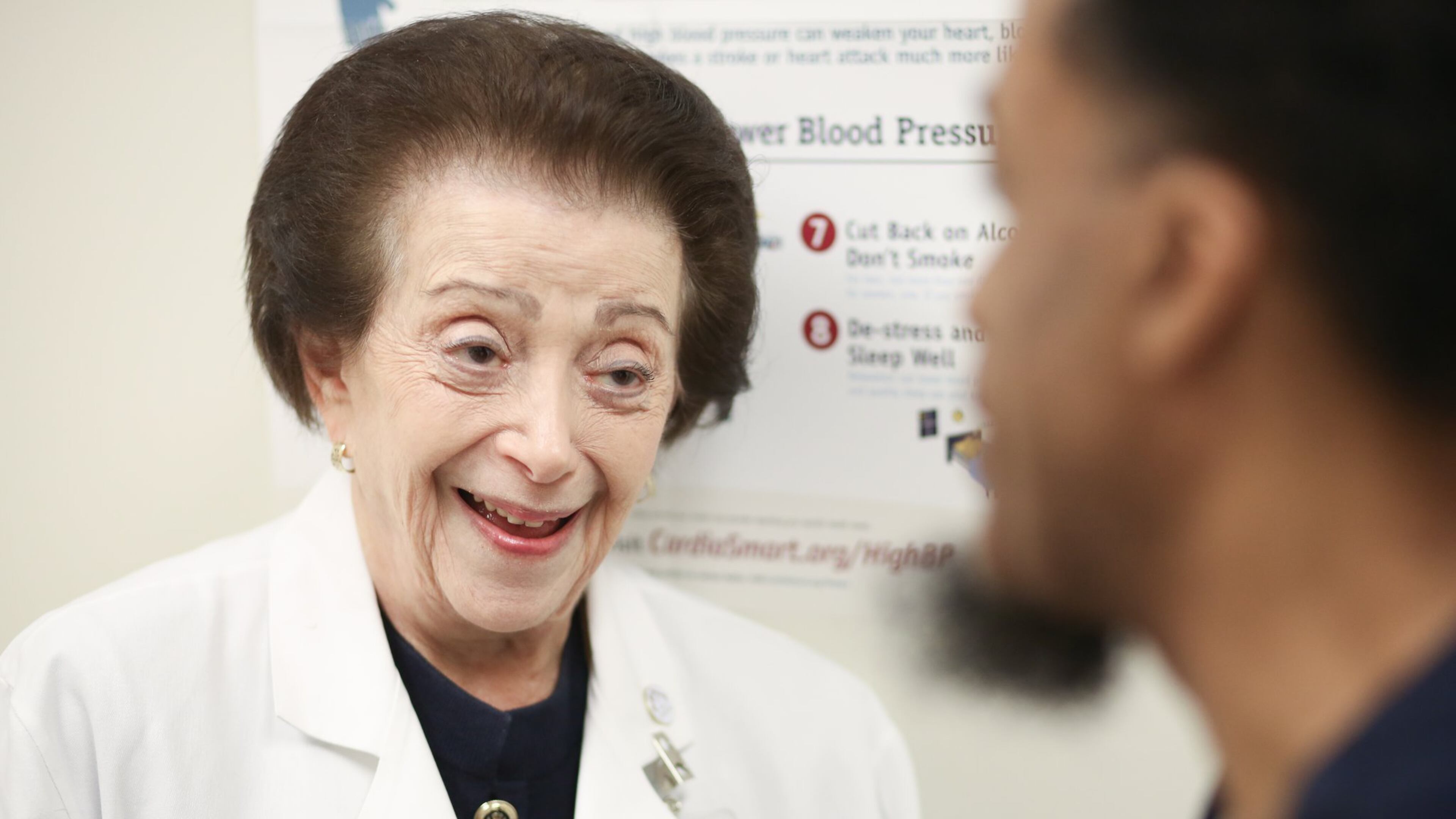 Dr. Nanette Wenger, a cardiologist, talks with patient Michael Daniels at Grady Hospital Wednesday. PHOTO / JASON GETZ