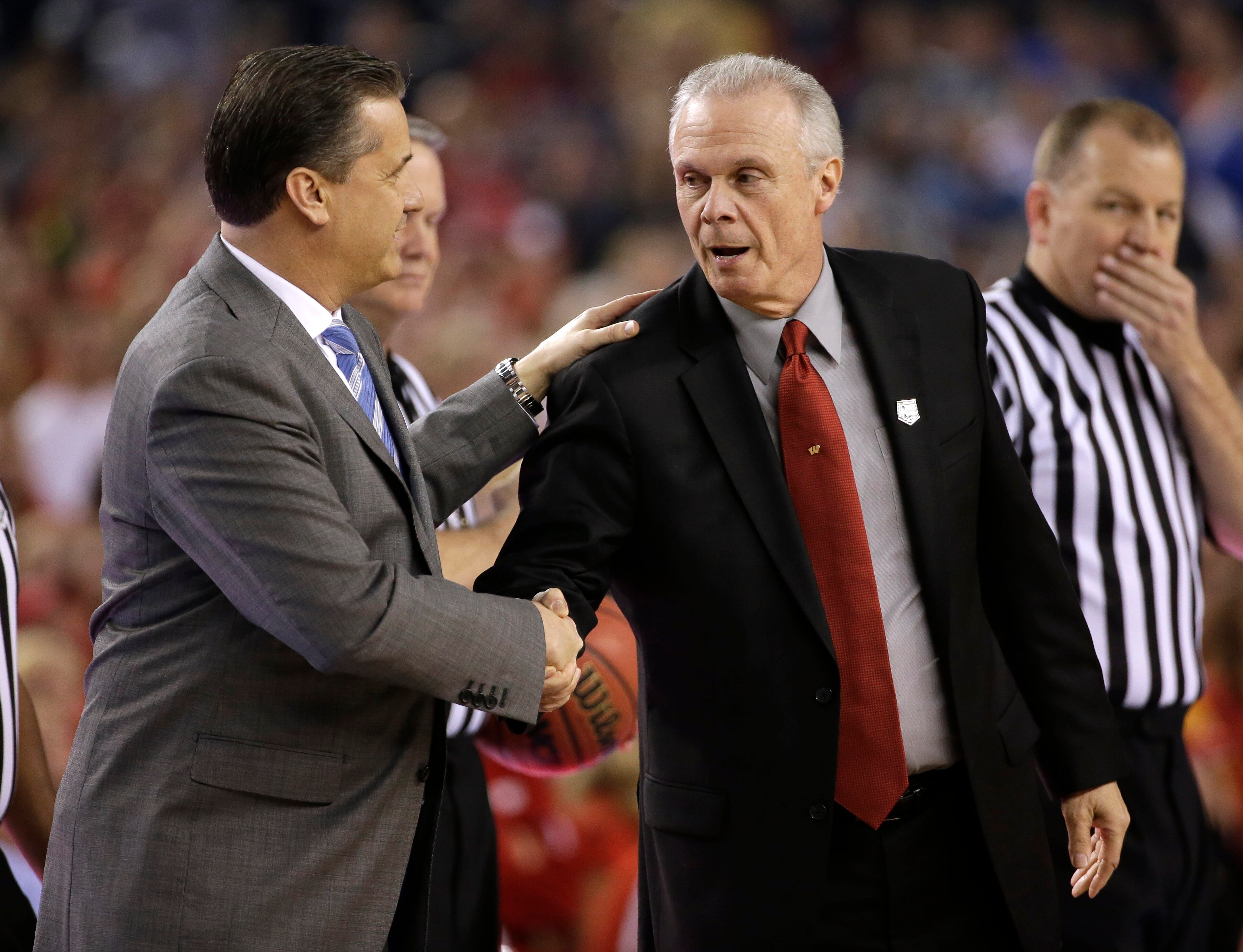 Kentucky head coach John Calipari, left, greets Wisconsin head coach Bo Ryan before an NCAA Final Four tournament college basketball semifinal game Saturday, April 5, 2014, in Arlington, Texas. (AP Photo/David J. Phillip)
