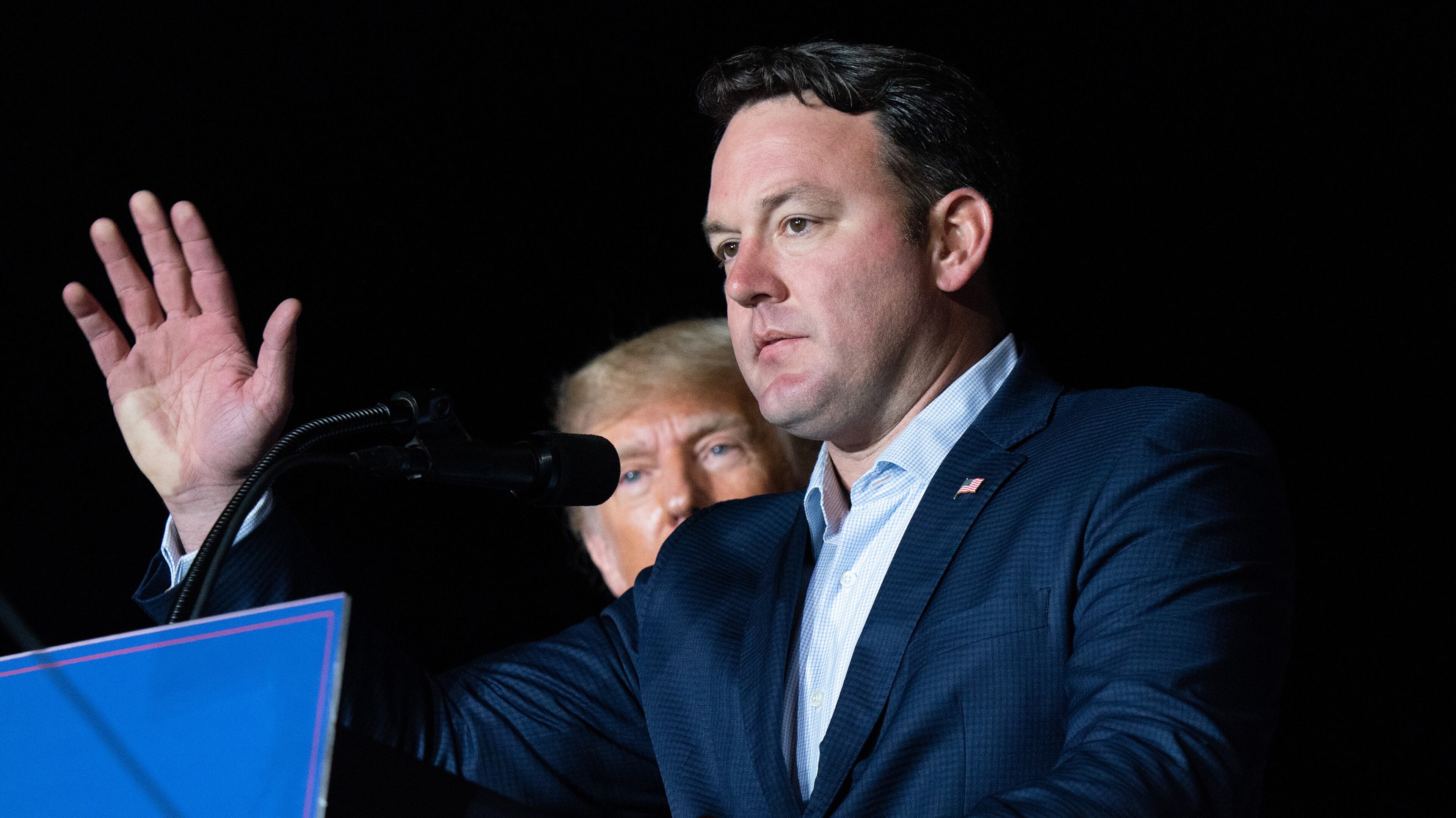 Georgia lieutenant gubernatorial candidate and Republican state Sen. Burt Jones speaks at a rally as former U.S. President Donald Trump watches on Sept. 25, 2021 in Perry, Georgia. (Sean Rayford/Getty Images/TNS)