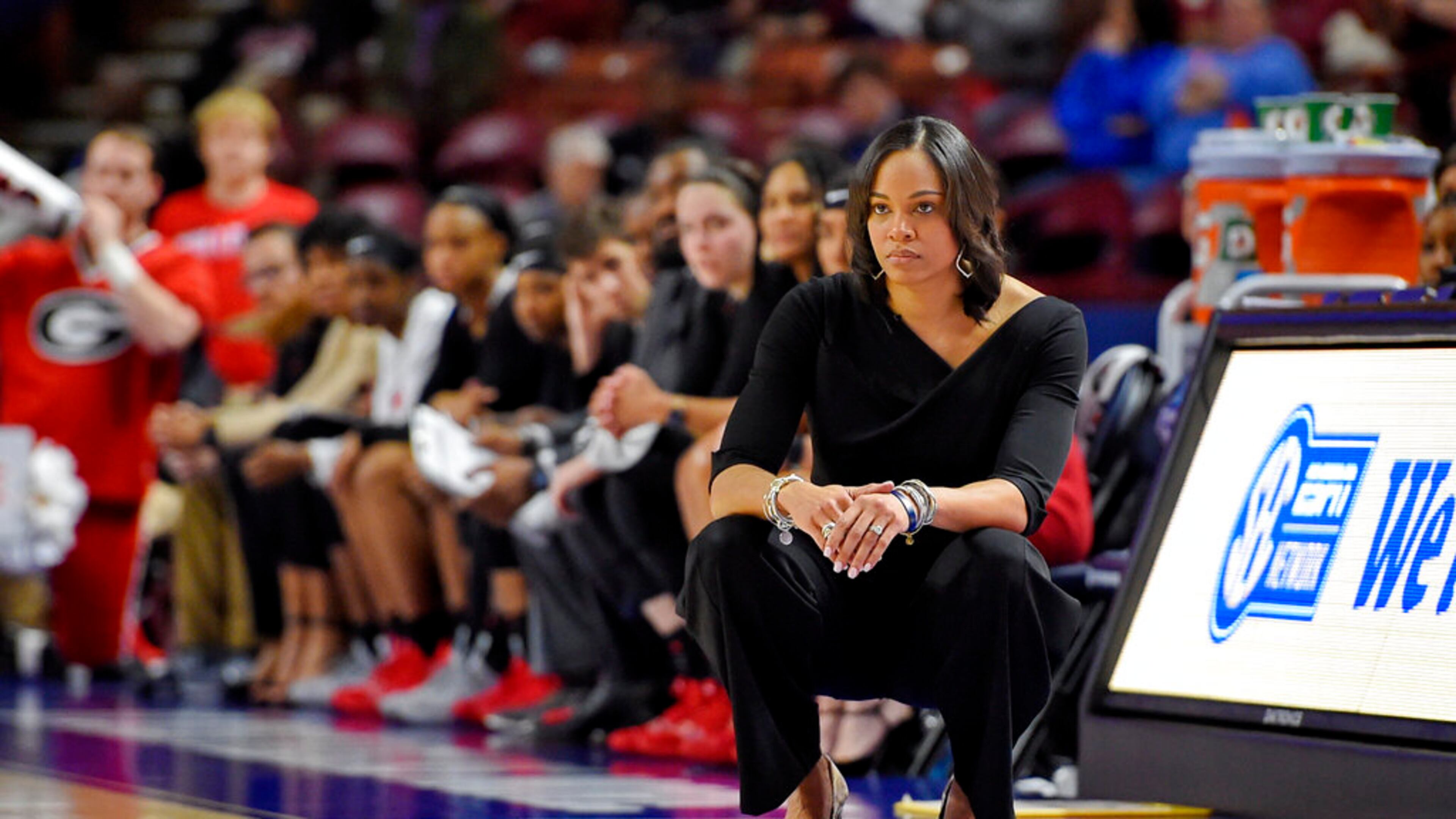 Georgia head coach Joni Taylor watches the action during the second half of a quarterfinal match against South Carolina at the Southeastern women's NCAA college basketball tournament in Greenville, S.C., Friday, March 6, 2020. (AP Photo/Richard Shiro)