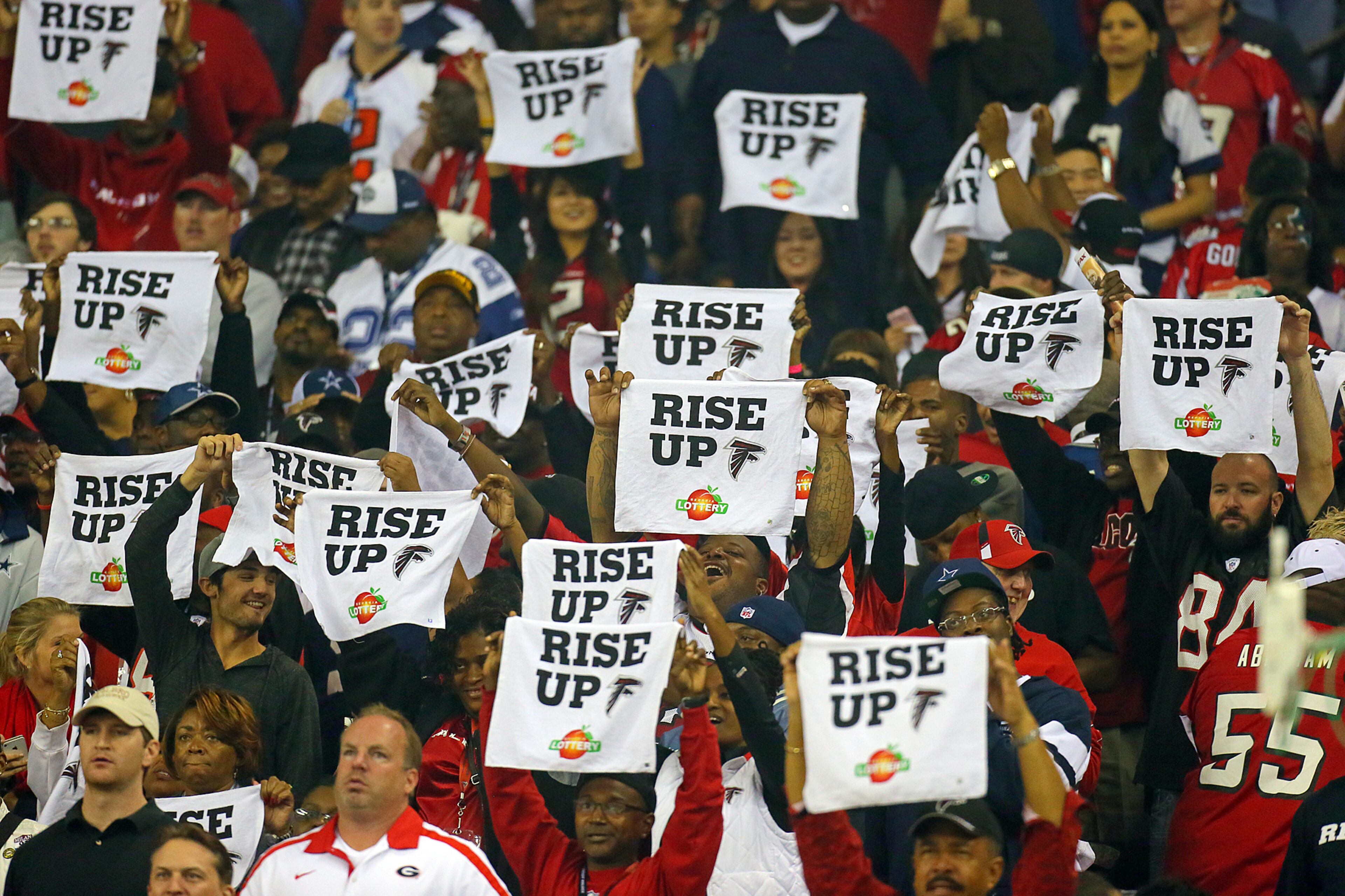 110412 ATLANTA: Falcons fans rise up during 1st half action against the Cowboys at the Georgia Dome in Atlanta on Sunday, Nov. 4, 2012. CURTIS COMPTON / CCOMPTON@AJC.COM