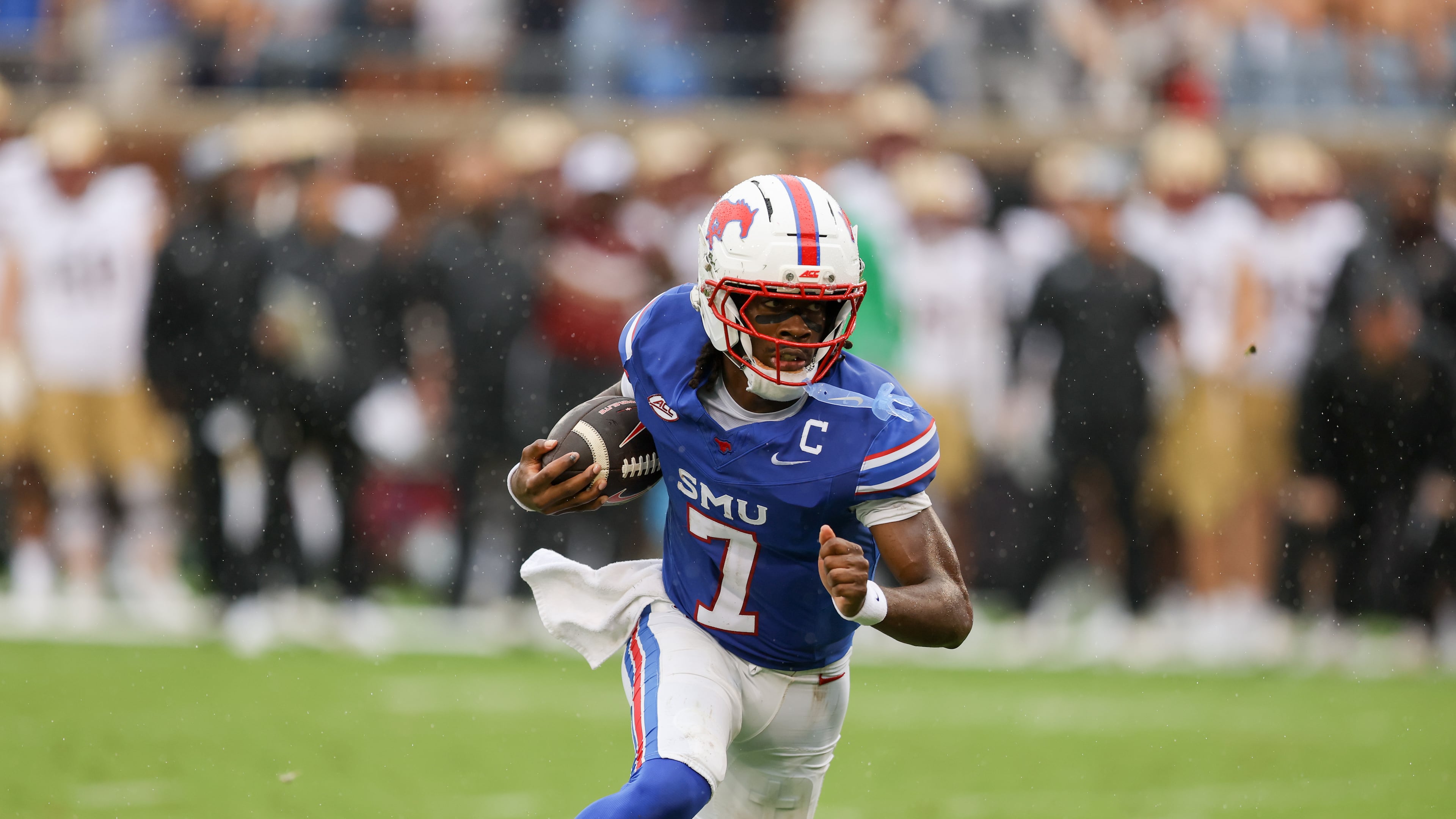 SMU quarterback Kevin Jennings rushes for a touchdown during an NCAA college football game against Boston College, Saturday, Oct. 3, 2026, in Dallas. (AP Photo/Gareth Patterson)