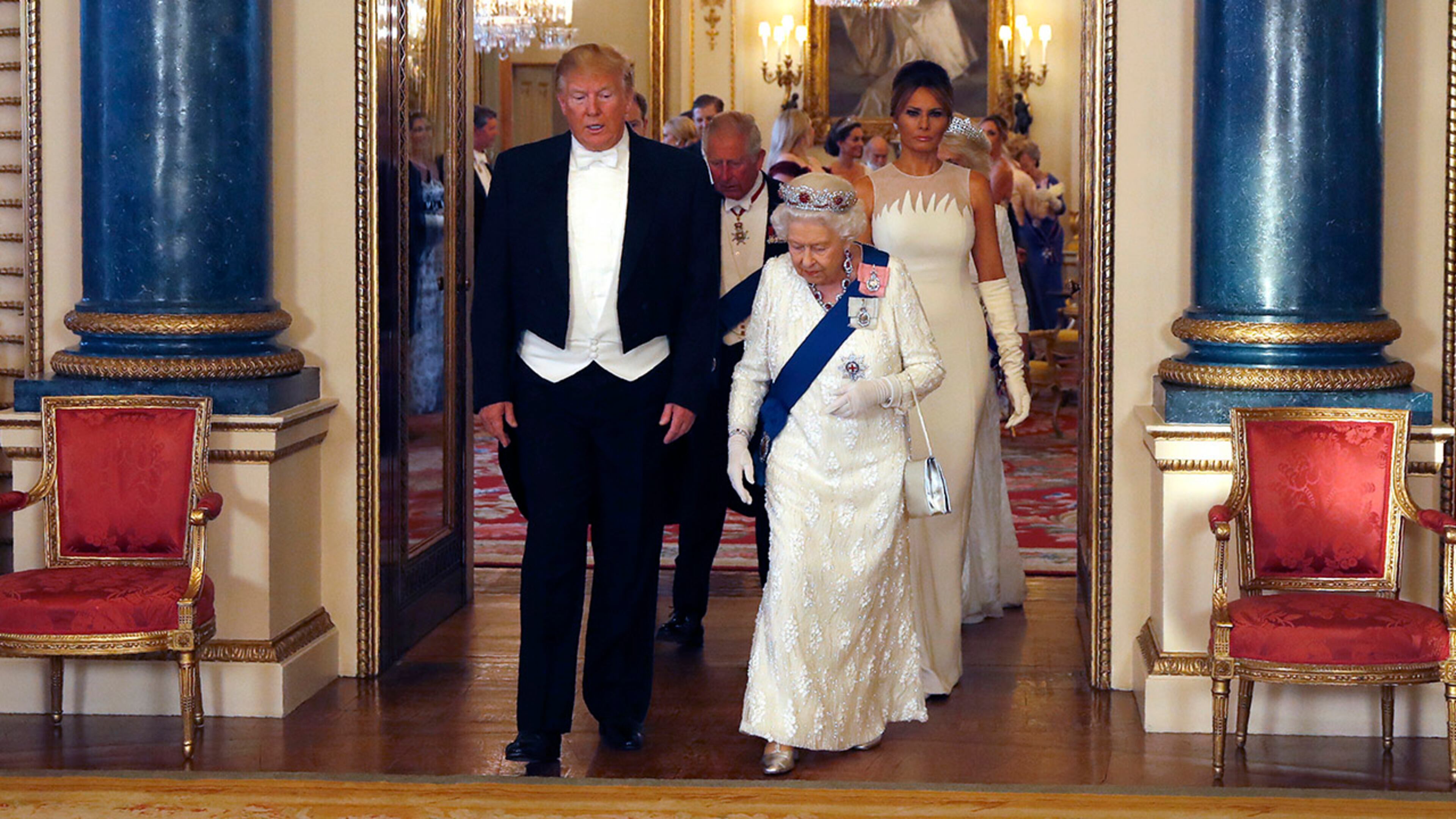 Britain's Queen Elizabeth II, President Donald Trump, left, first lady Melania Trump and Prince Charles arrive ahead of the state banquet at Buckingham Palace in London, Monday, June 3, 2019. Trump is on a three-day state visit to Britain.