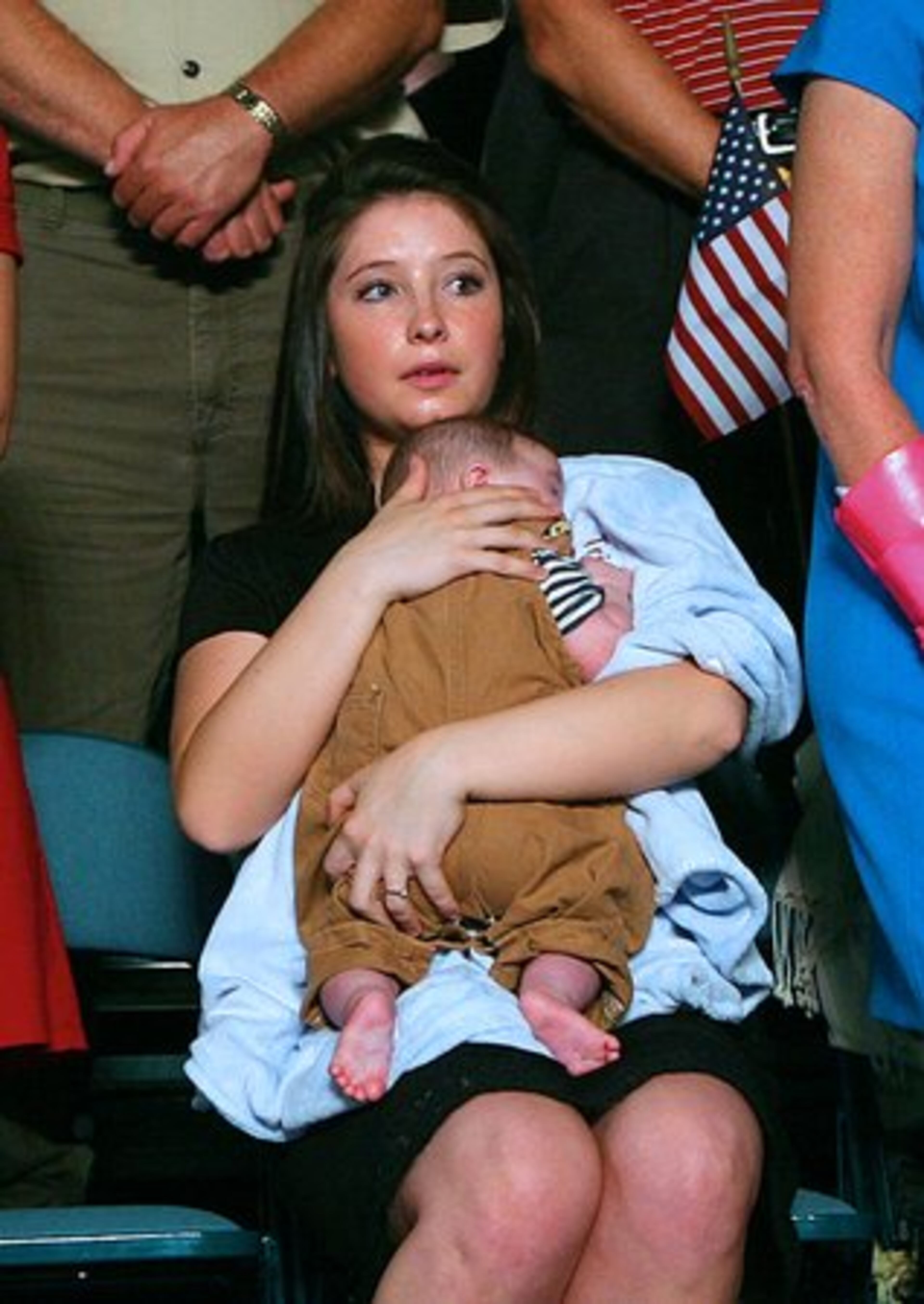 During her mother's introduction to the nation as John McCain's VP running mate, Bristol sat in the background with her infant brother Trig and other family members.