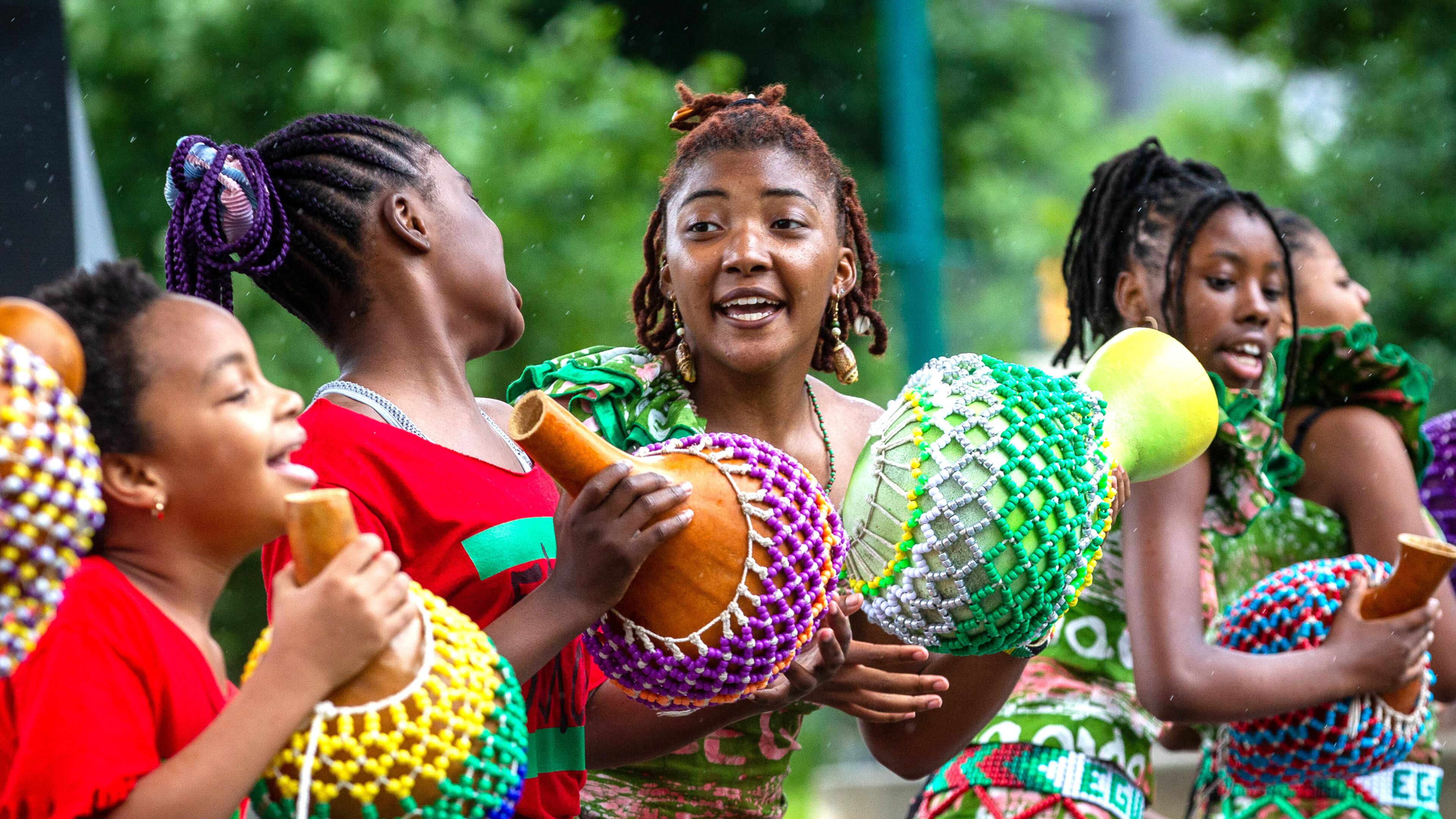 The performing arts collective Egun Omode performs at Centennial Olympic Park for the Juneteenth Atlanta Parade and Music Festival on Saturday, June 19, 2021. (Photo: Steve Schaefer for The Atlanta Journal-Constitution)