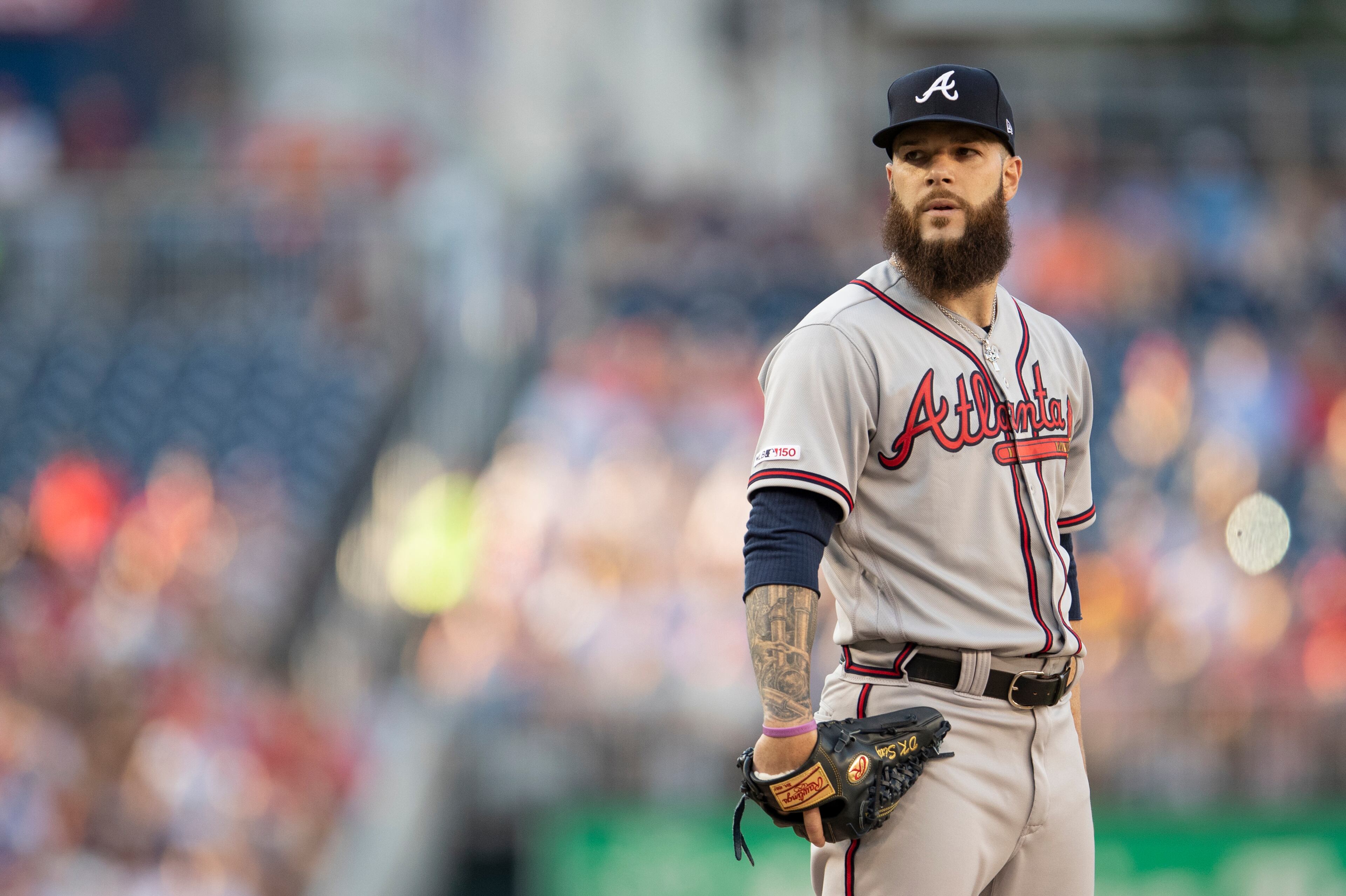 Atlanta Braves starting pitcher Dallas Keuchel looks at his catcher during the first inning of a baseball game against the Washington Nationals in Washington, Friday, June 21, 2019. (AP Photo/Manuel Balce Ceneta)
