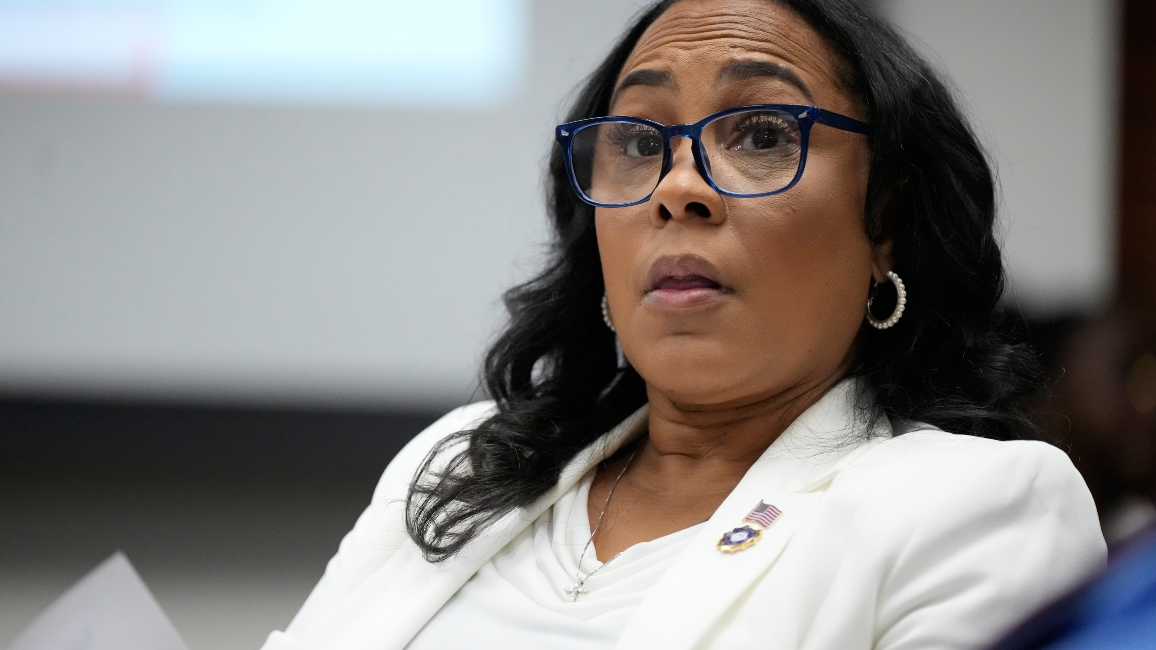 Fulton County District Attorney Fani Willis is seen at the Georgia State Capitol during questioning from a Georgia State Senate panel about her prosecution of President Donald Trump on Wednesday, Dec. 17, 2025, in Atlanta. (AP Photo/Brynn Anderson)