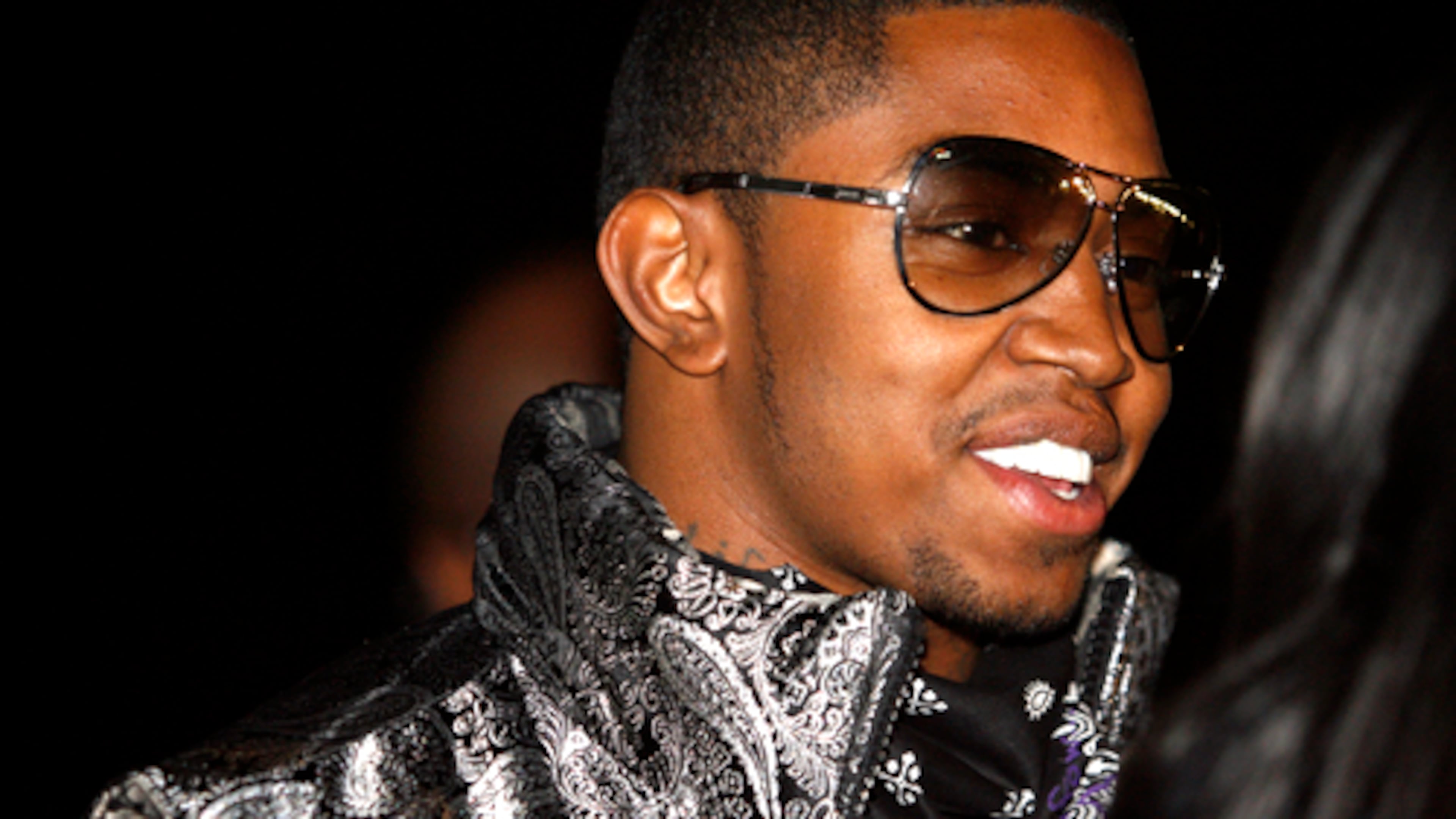 Rapper Lil' Scrappy turns out in support of the birthday girl.