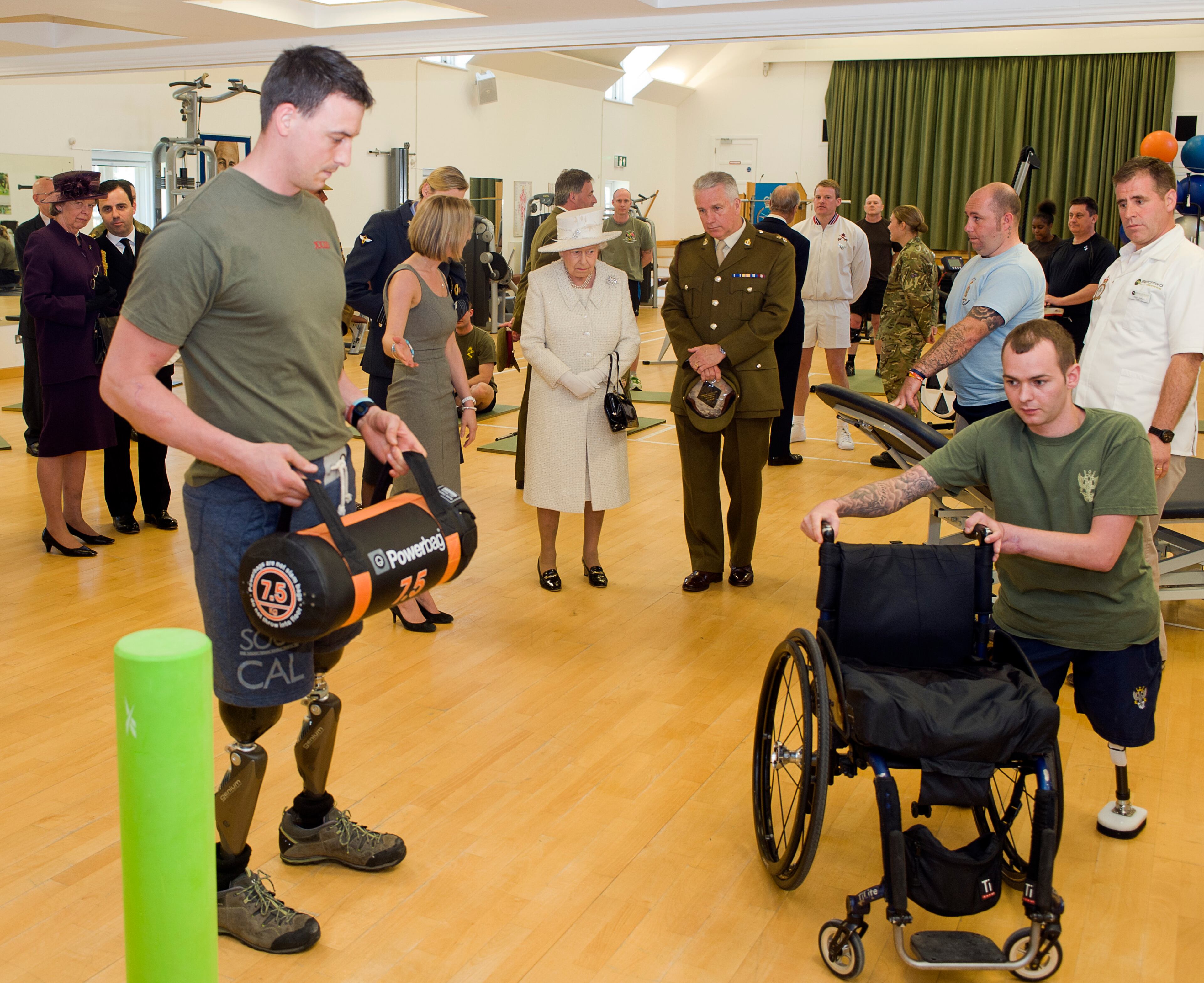Queen Elizabeth II meets with patients and staff at the defence medical rehabilitation centre at Headley Court on May 02, 2013 in Surrey, England. (Photo by David Parker - WPA Pool/Getty Images)